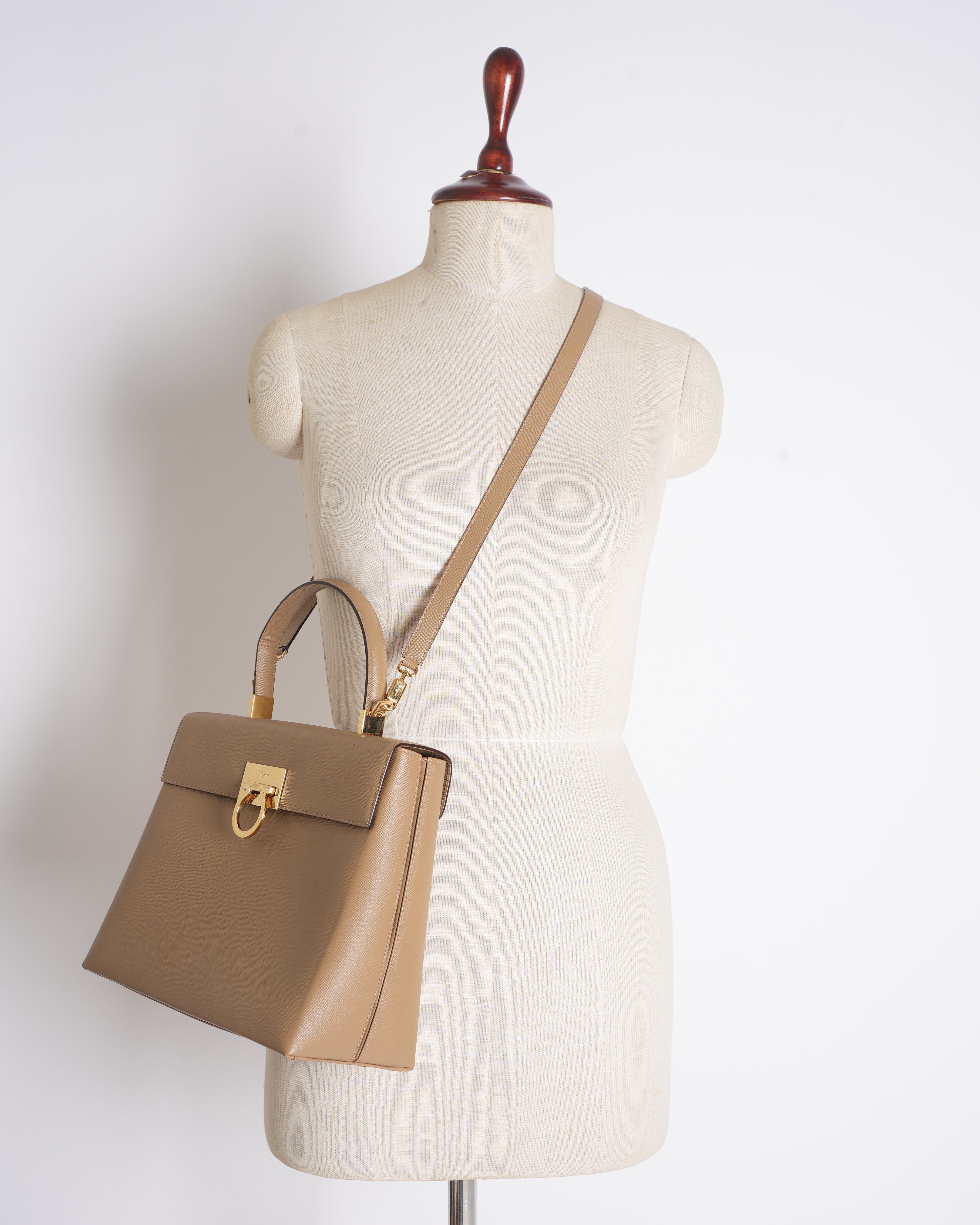 Salvatore Ferragamo nude omega logo handbag
