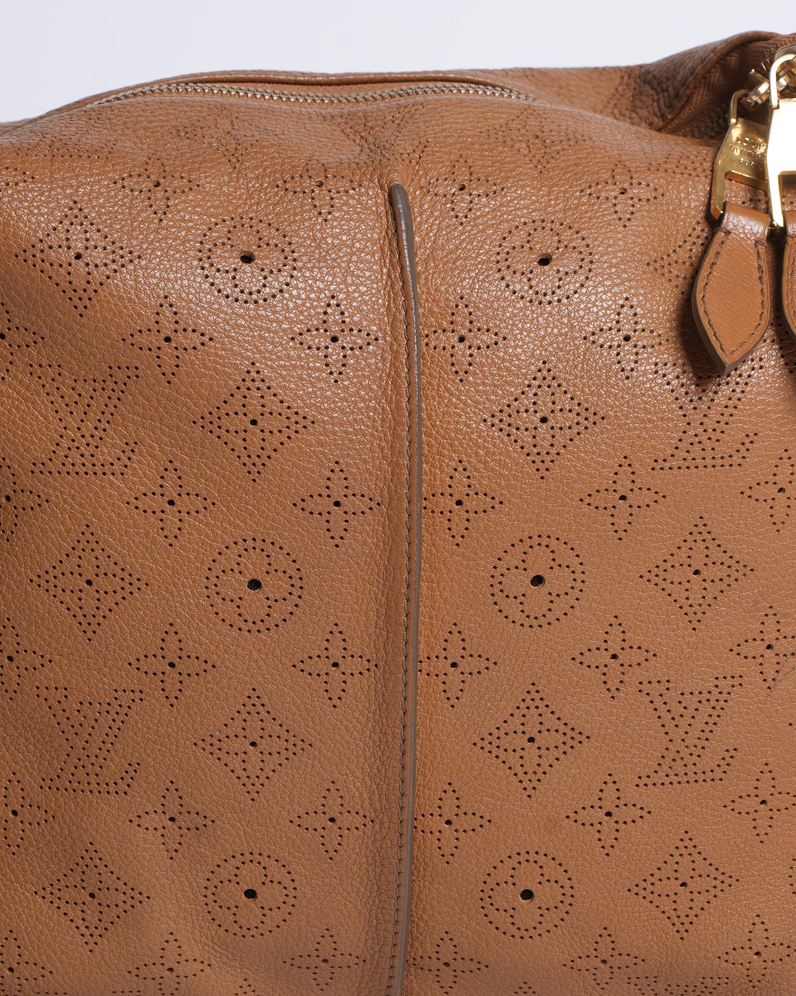 Louis Vuitton
Caramel Monogram Mahina Leather Selene PM Shoulder Bag