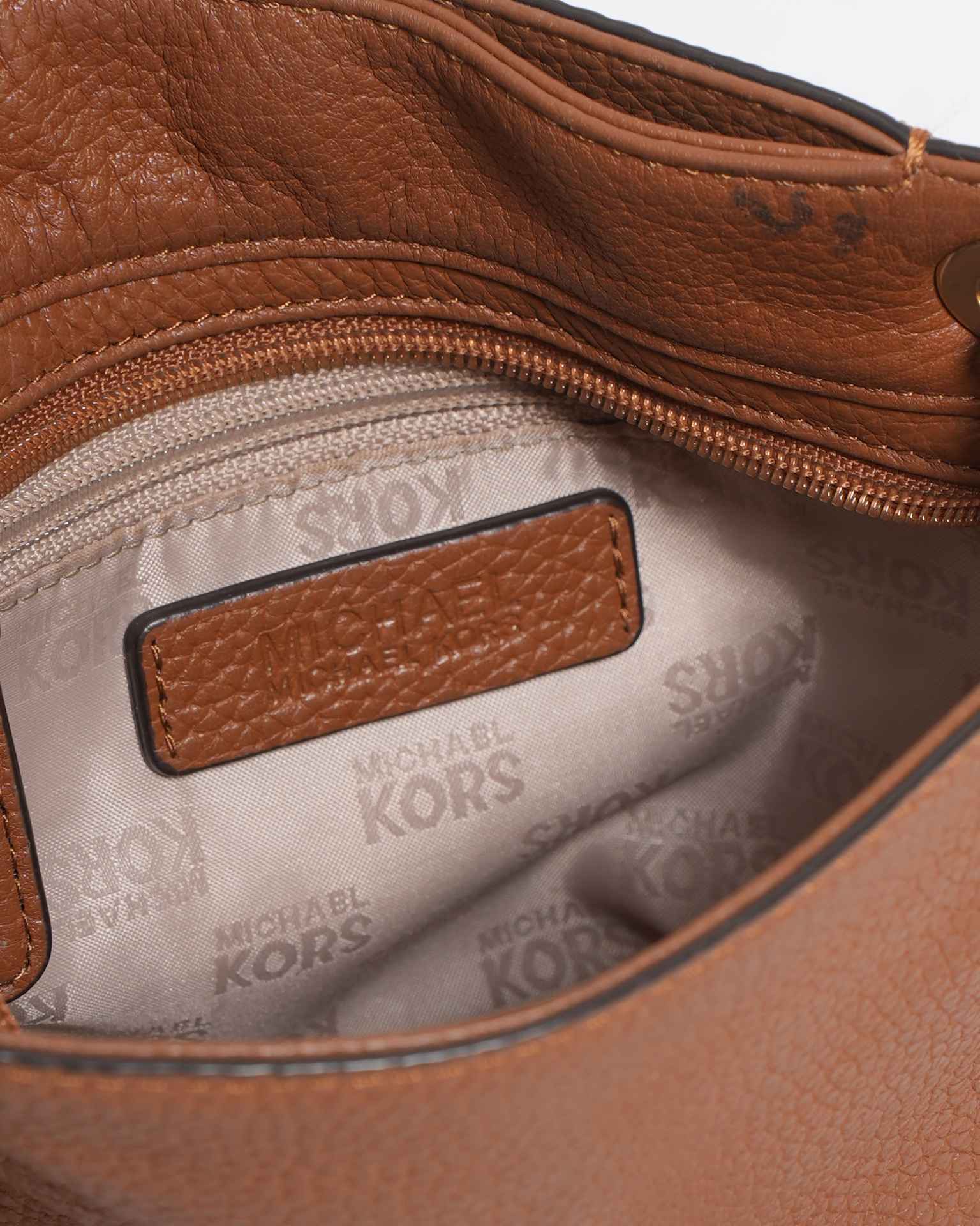 Michael Kors brown crossbody with fringe detail