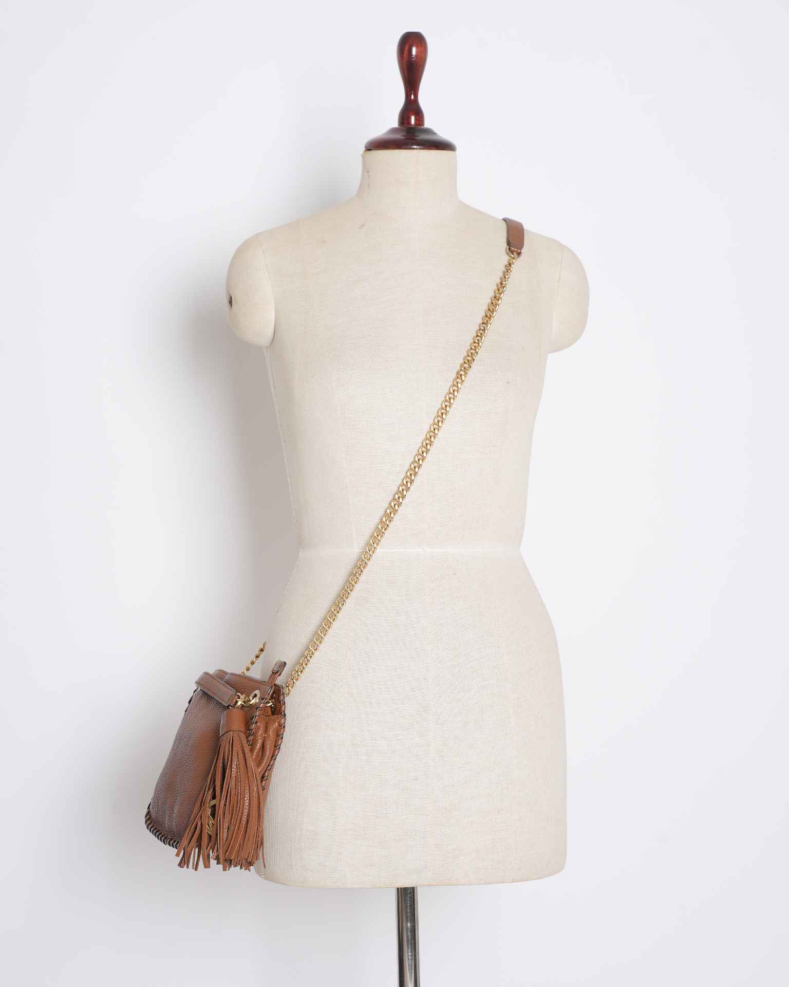 Michael Kors brown crossbody with fringe detail