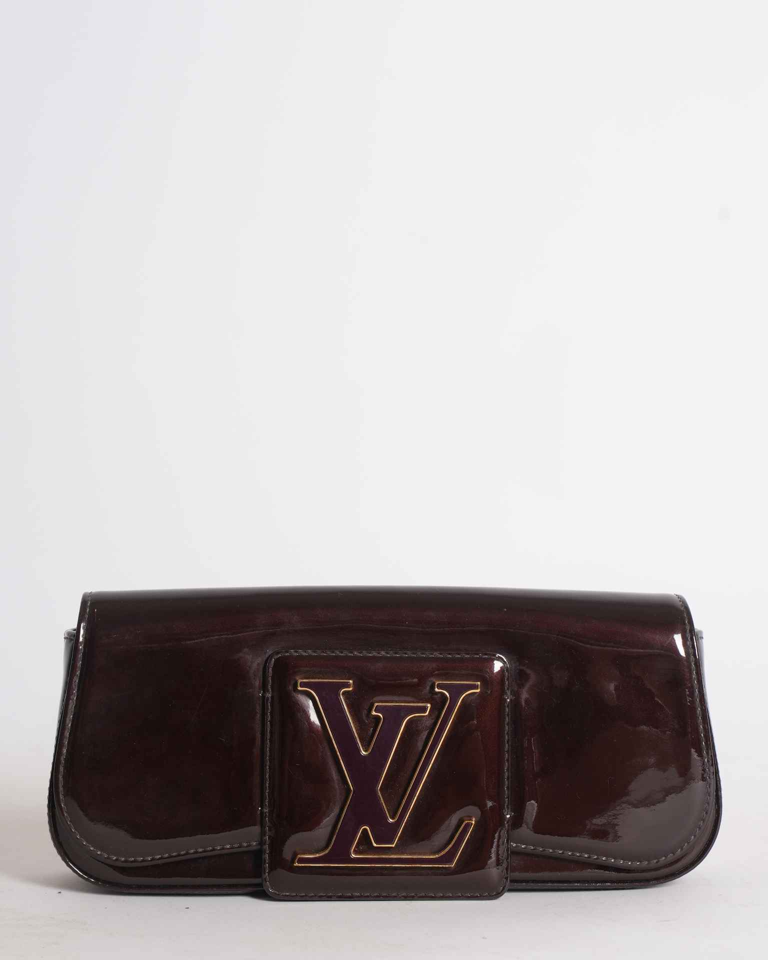 Louis Vuitton Sobe Clutch