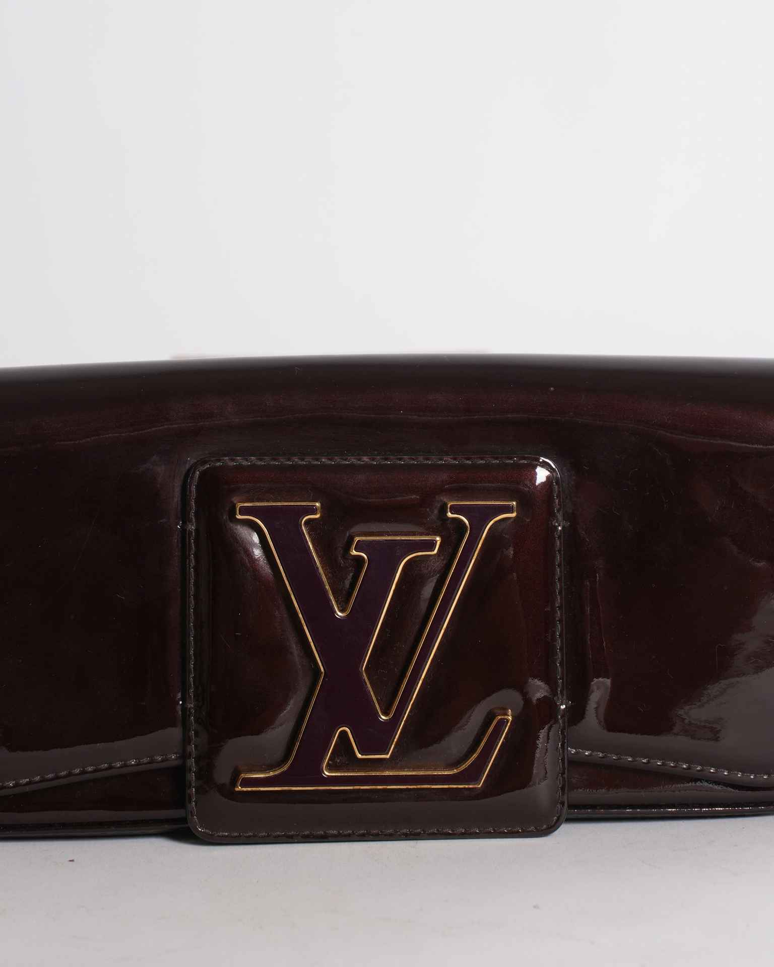 Louis Vuitton Sobe Clutch