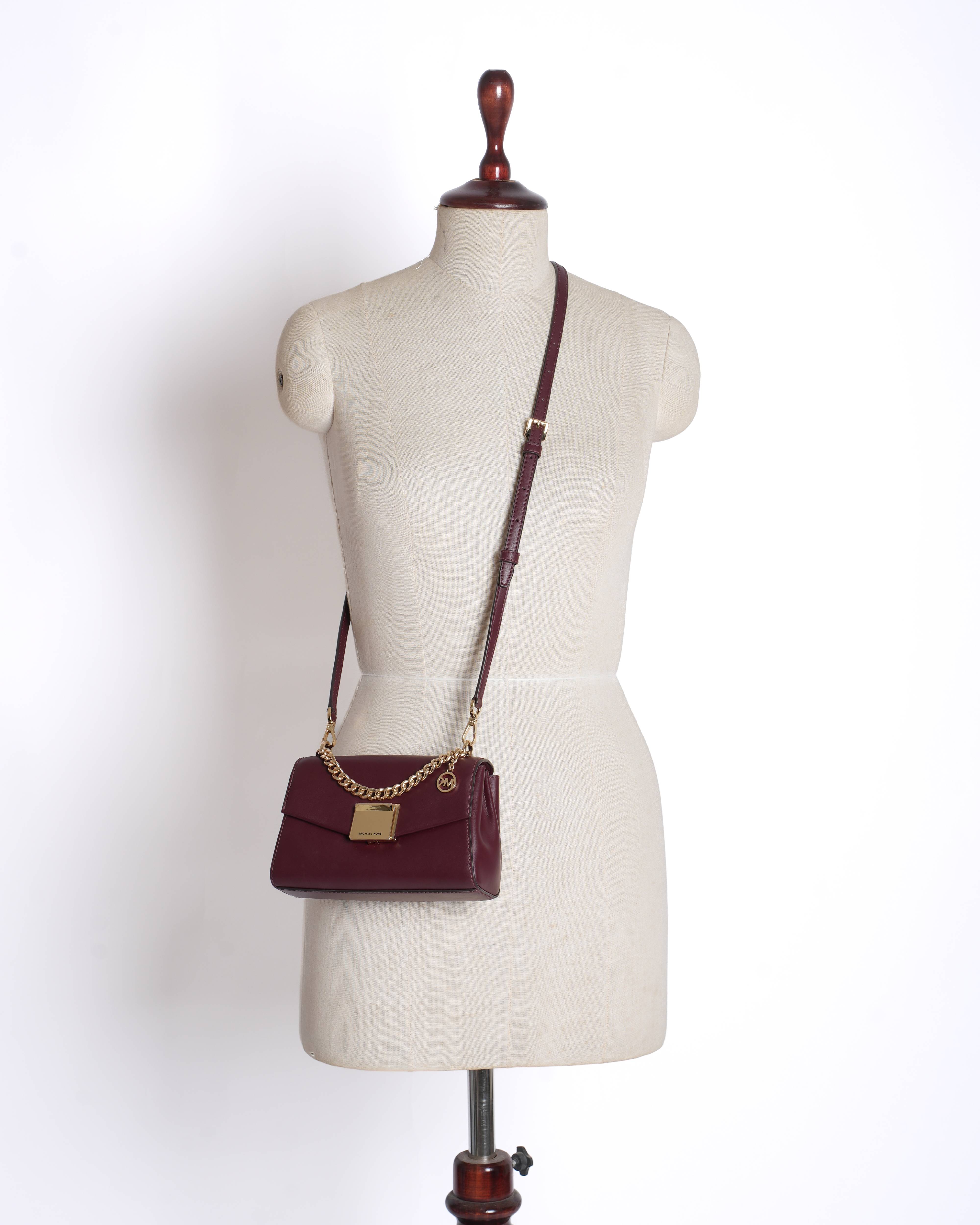Michael Kors
Maroon sling bag