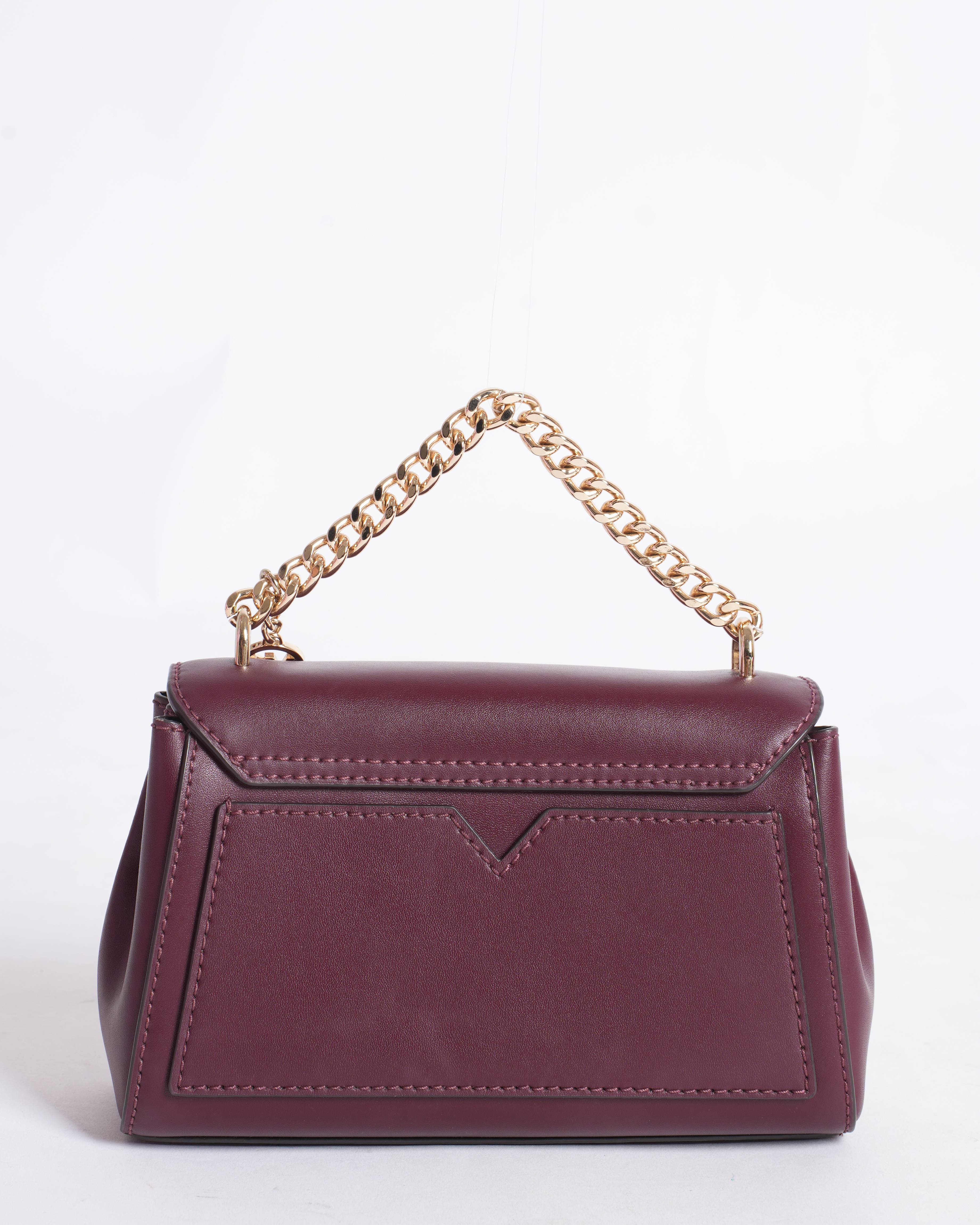 Michael Kors
Maroon sling bag