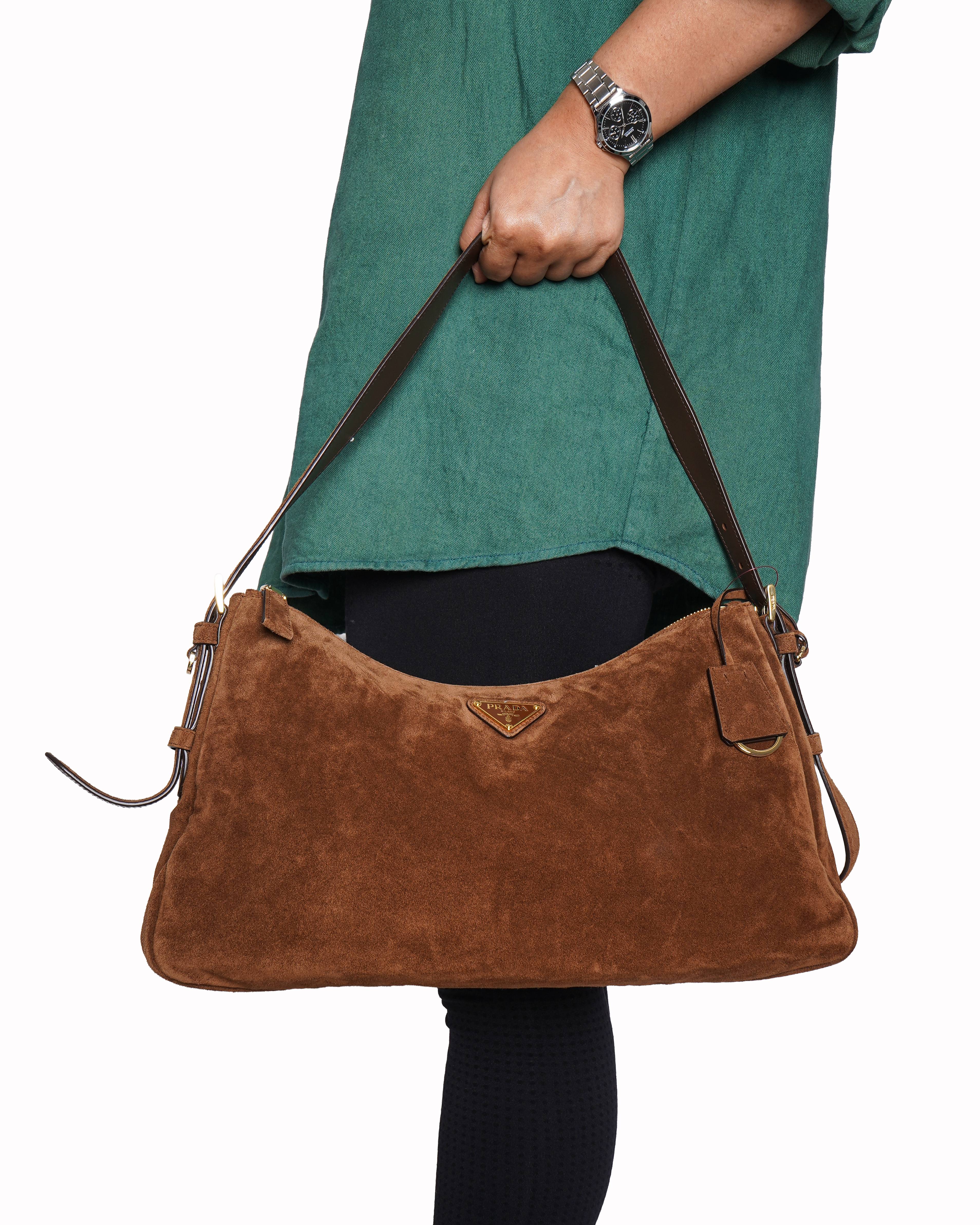 Prada
Aimée medium suede shoulder bag