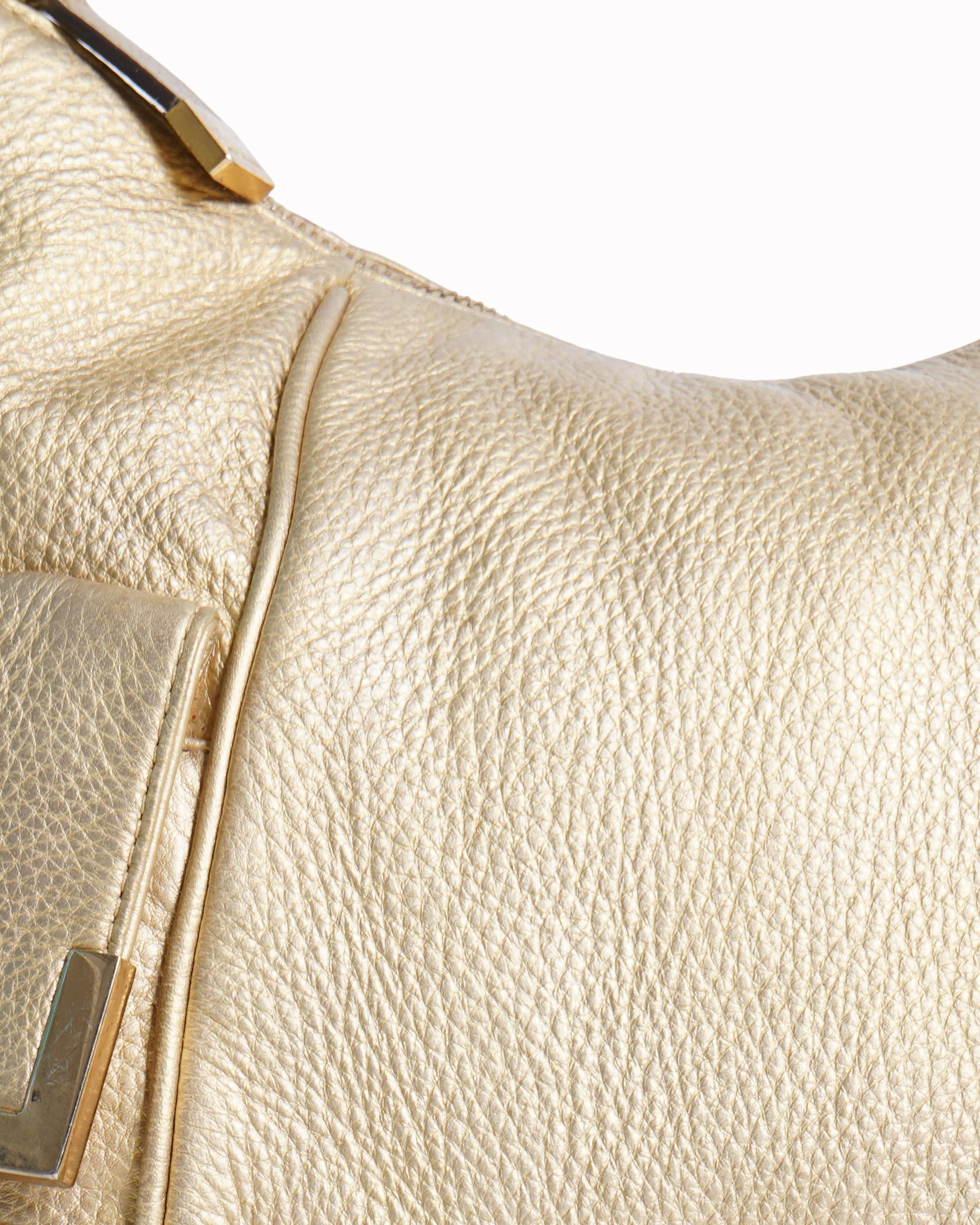 Michael kors golden handbag