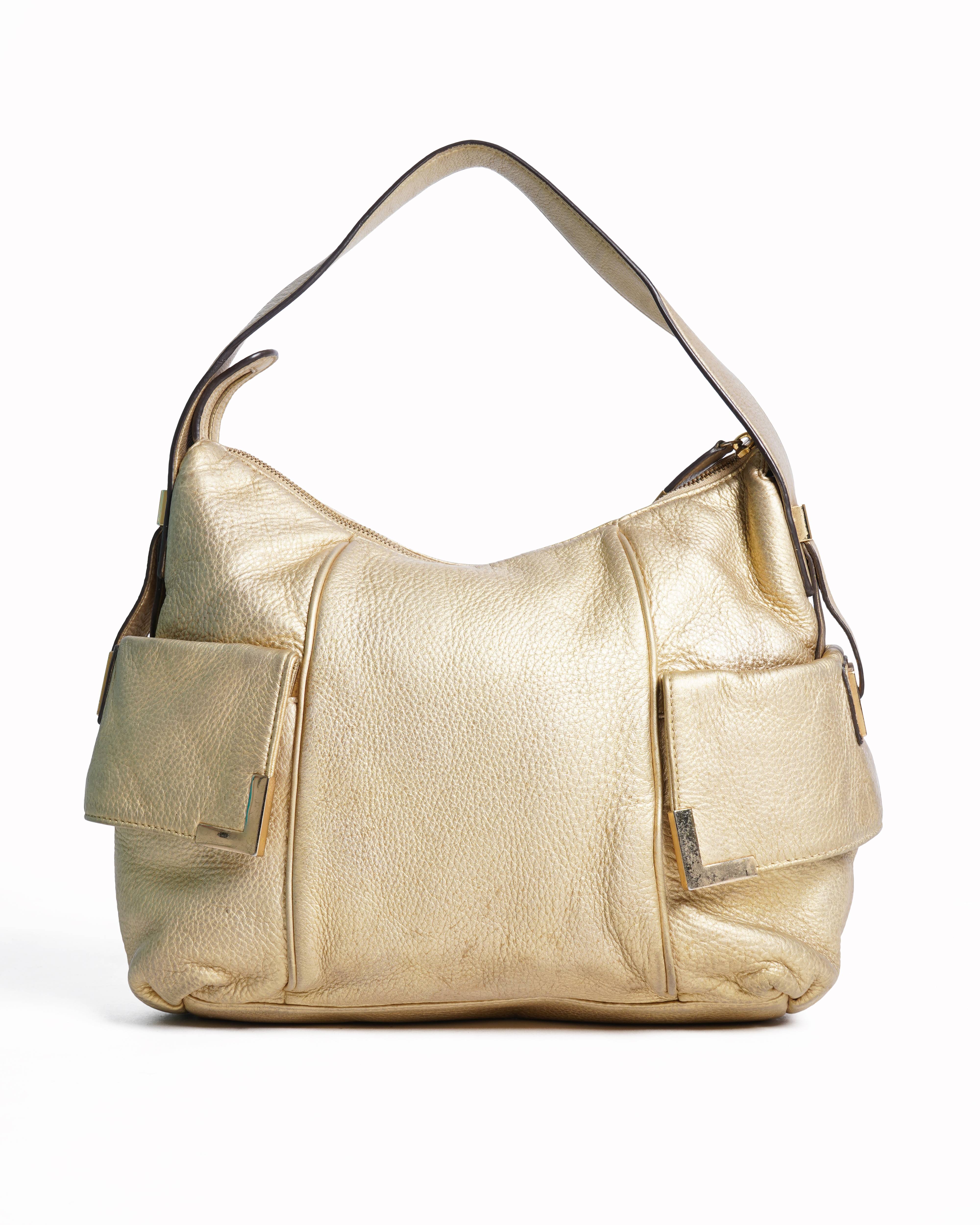 Michael kors golden handbag