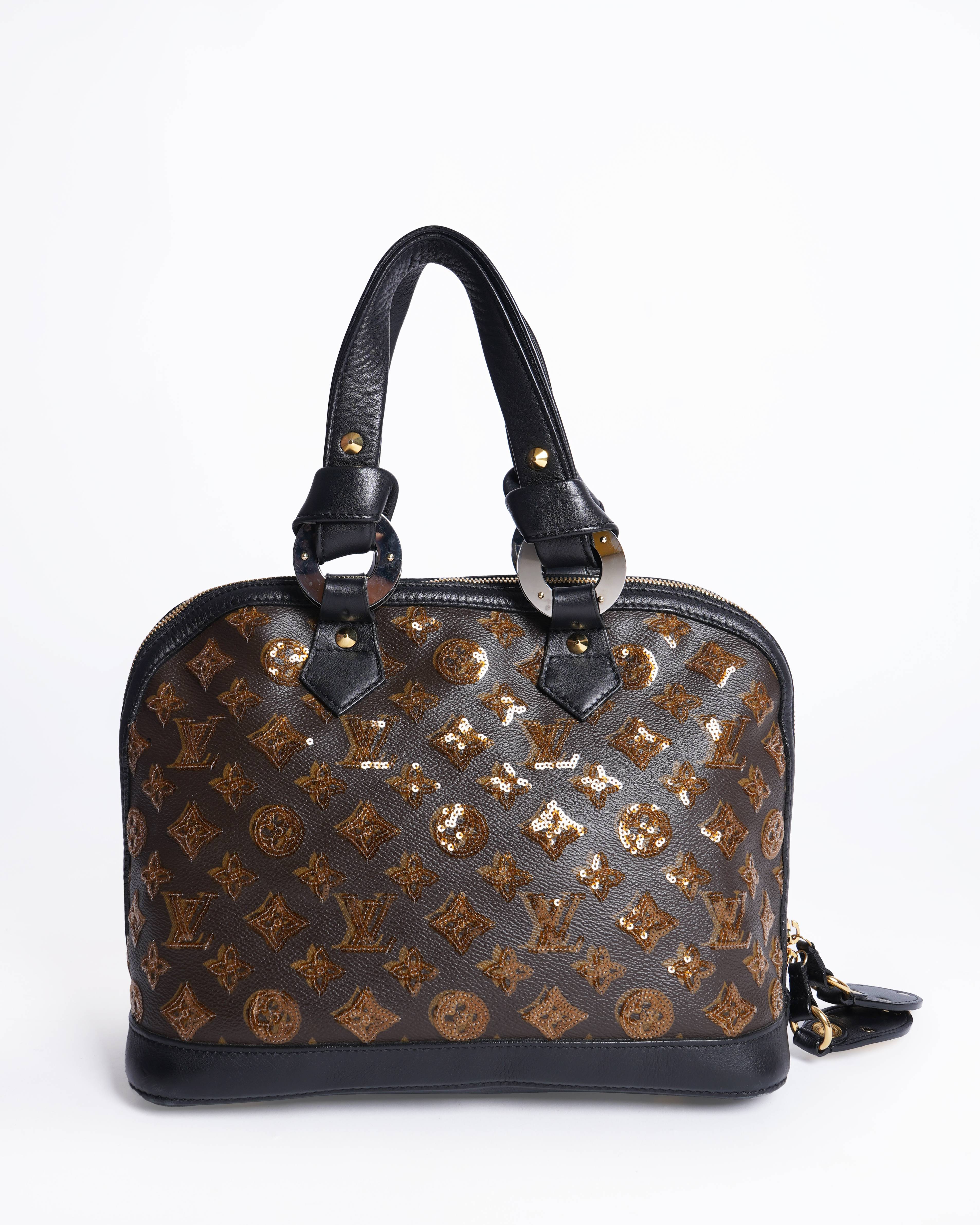 Louis Vuitton
Limited Edition Amber Monogram Eclipse Alma Bag