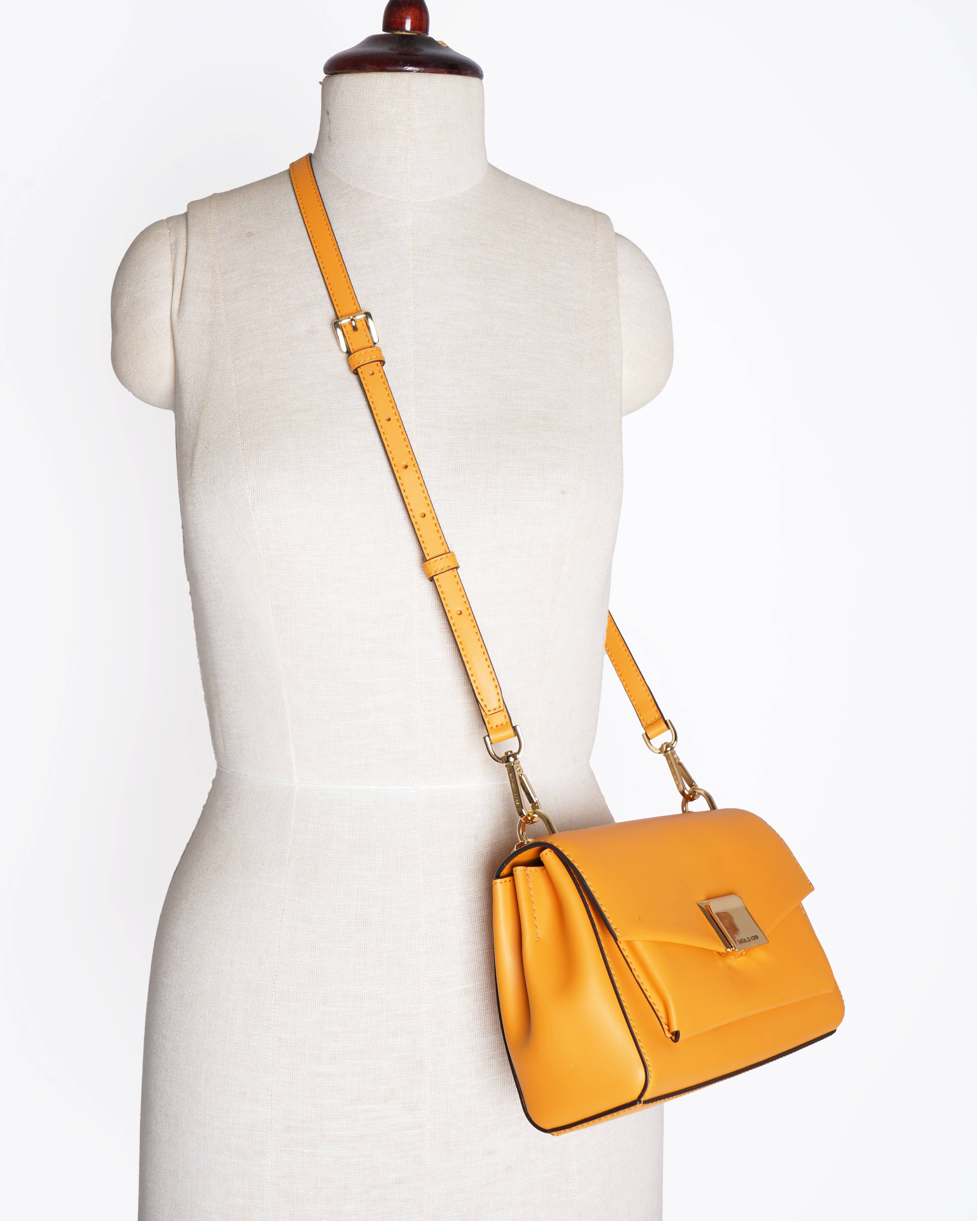 Michael kors 
Lita Signature Medium Leather Crossbody Bag