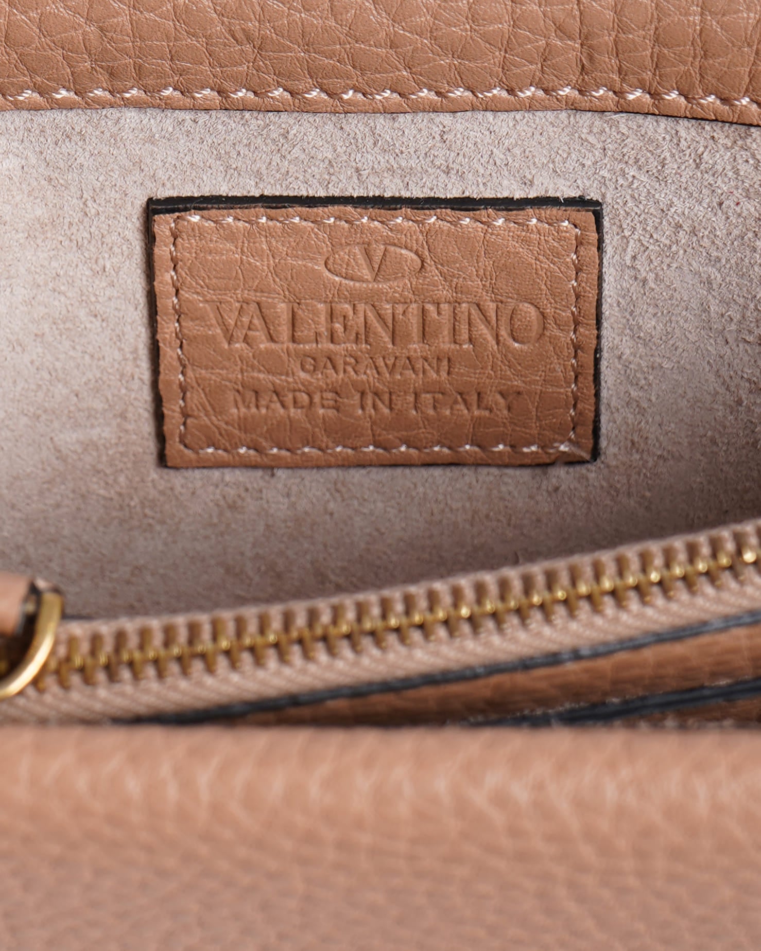Valentino grained leather rolling rockstud wristlet clutch