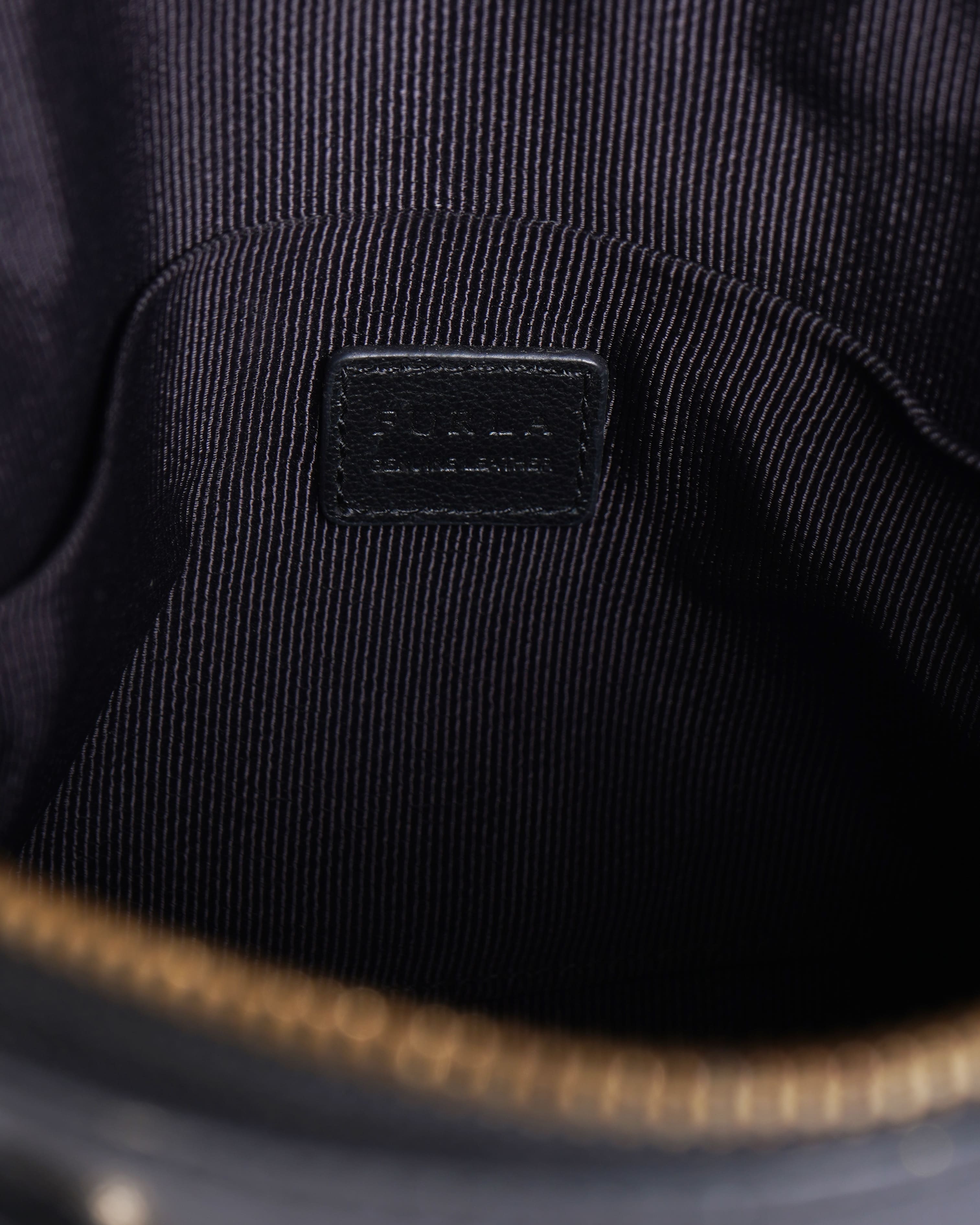 Furla black leather sling bag