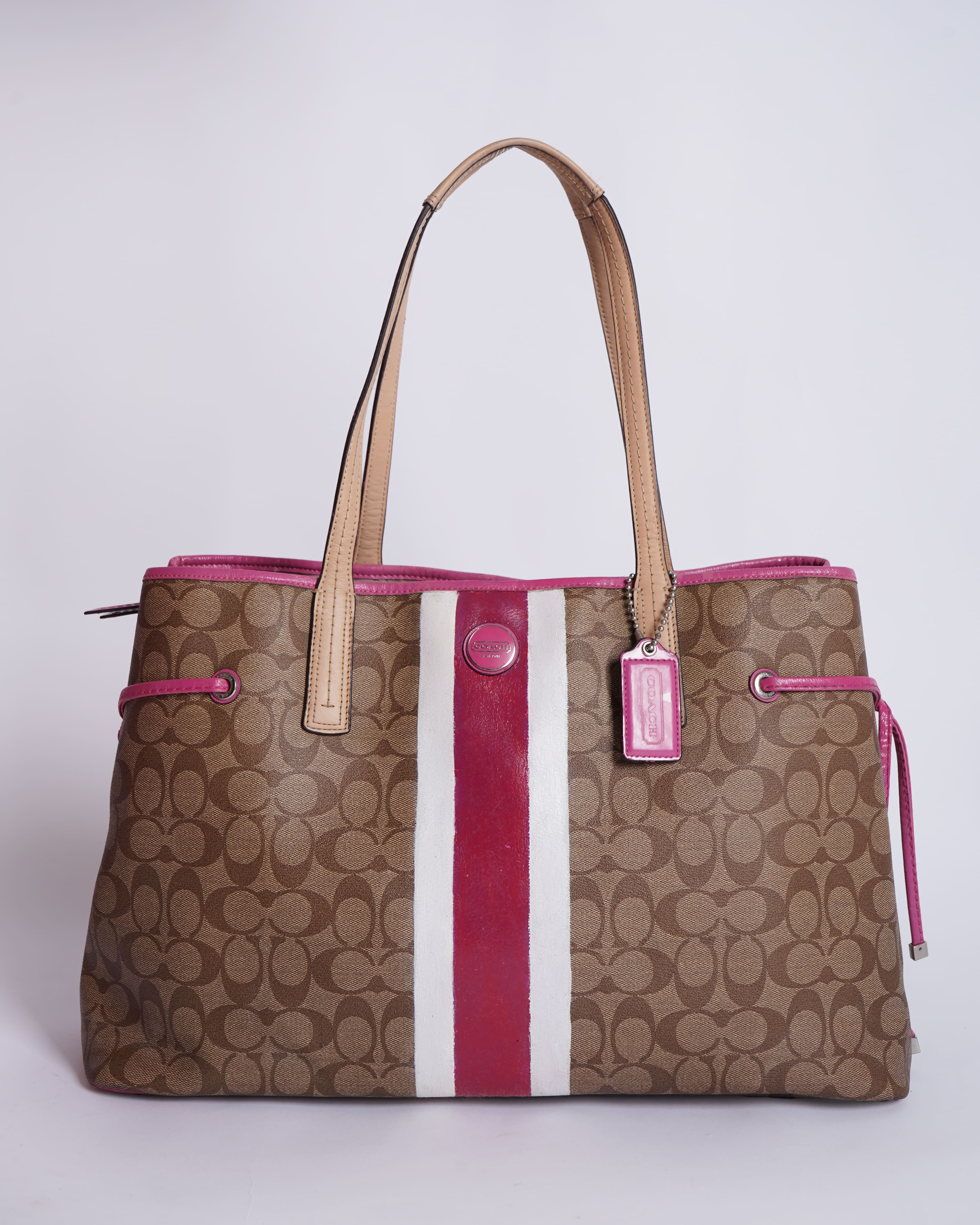 Coach Beige/Pink Signture Coated Canvas and
Leather Striped Drawstring Tote