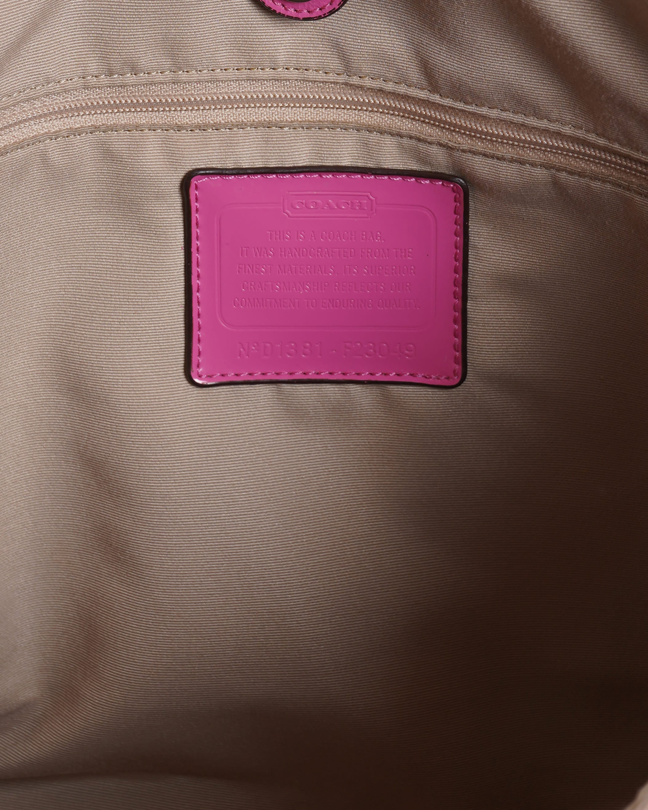 Coach Beige/Pink Signture Coated Canvas and
Leather Striped Drawstring Tote