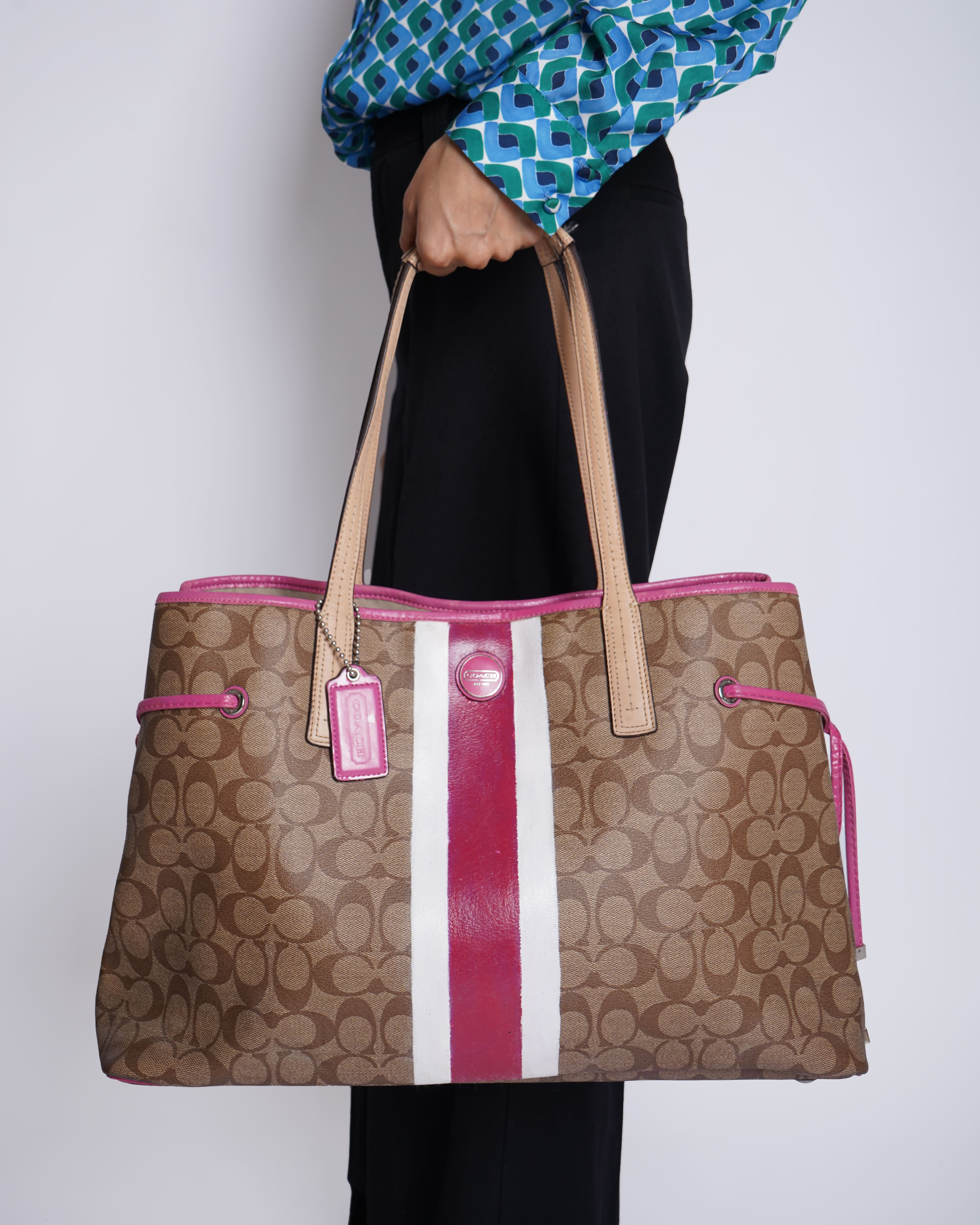 Coach Beige/Pink Signture Coated Canvas and
Leather Striped Drawstring Tote