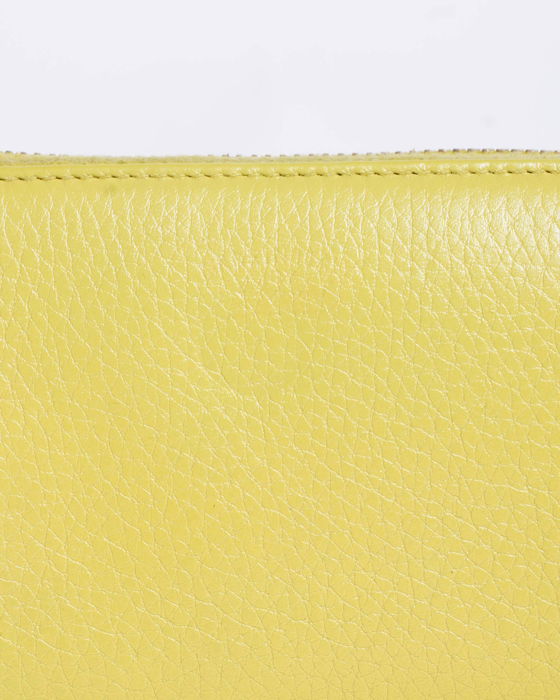 Gucci Leather Zippy Wallet in Yellow