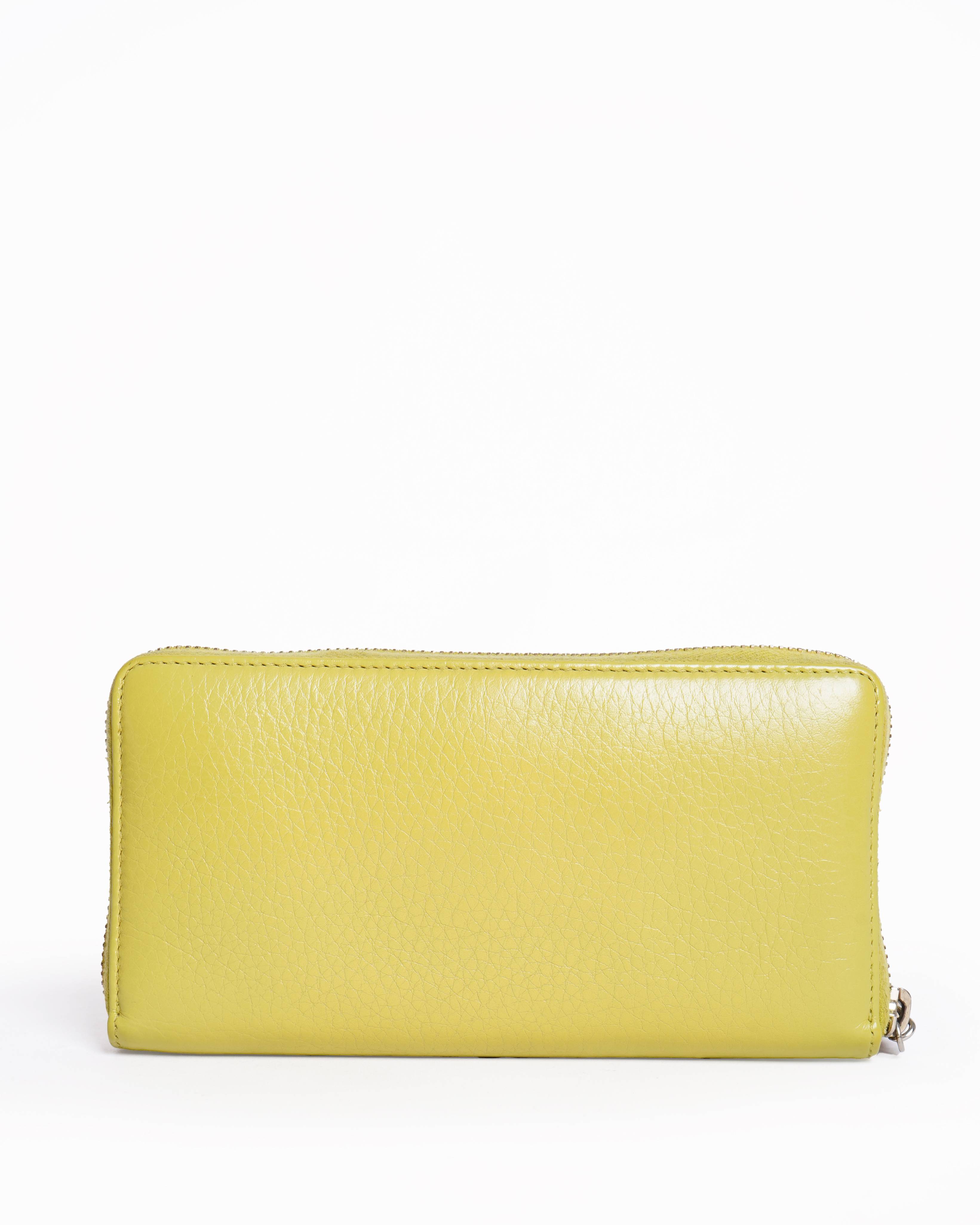 Gucci Leather Zippy Wallet in Yellow