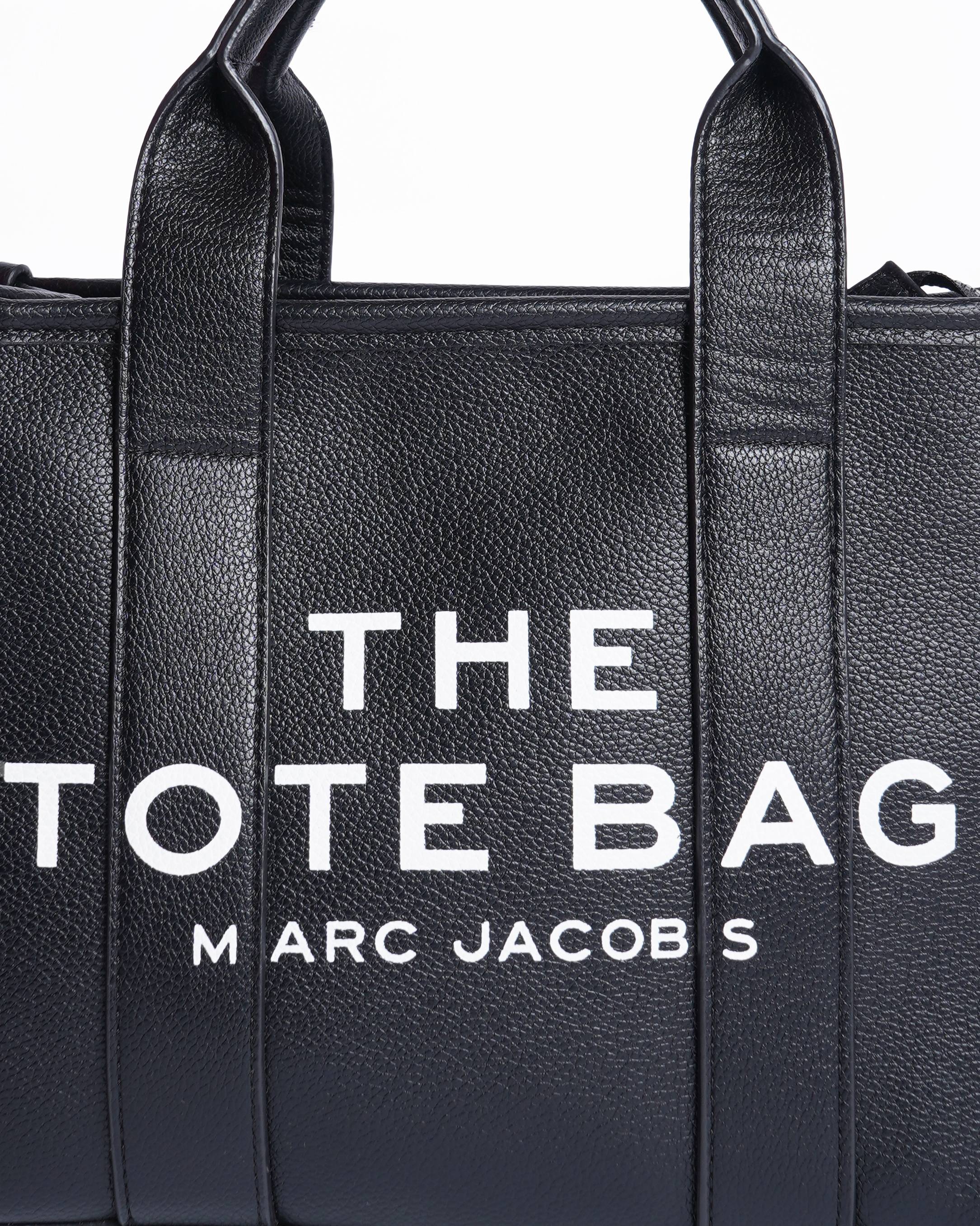 The marc jacobs black leather small tote bag
