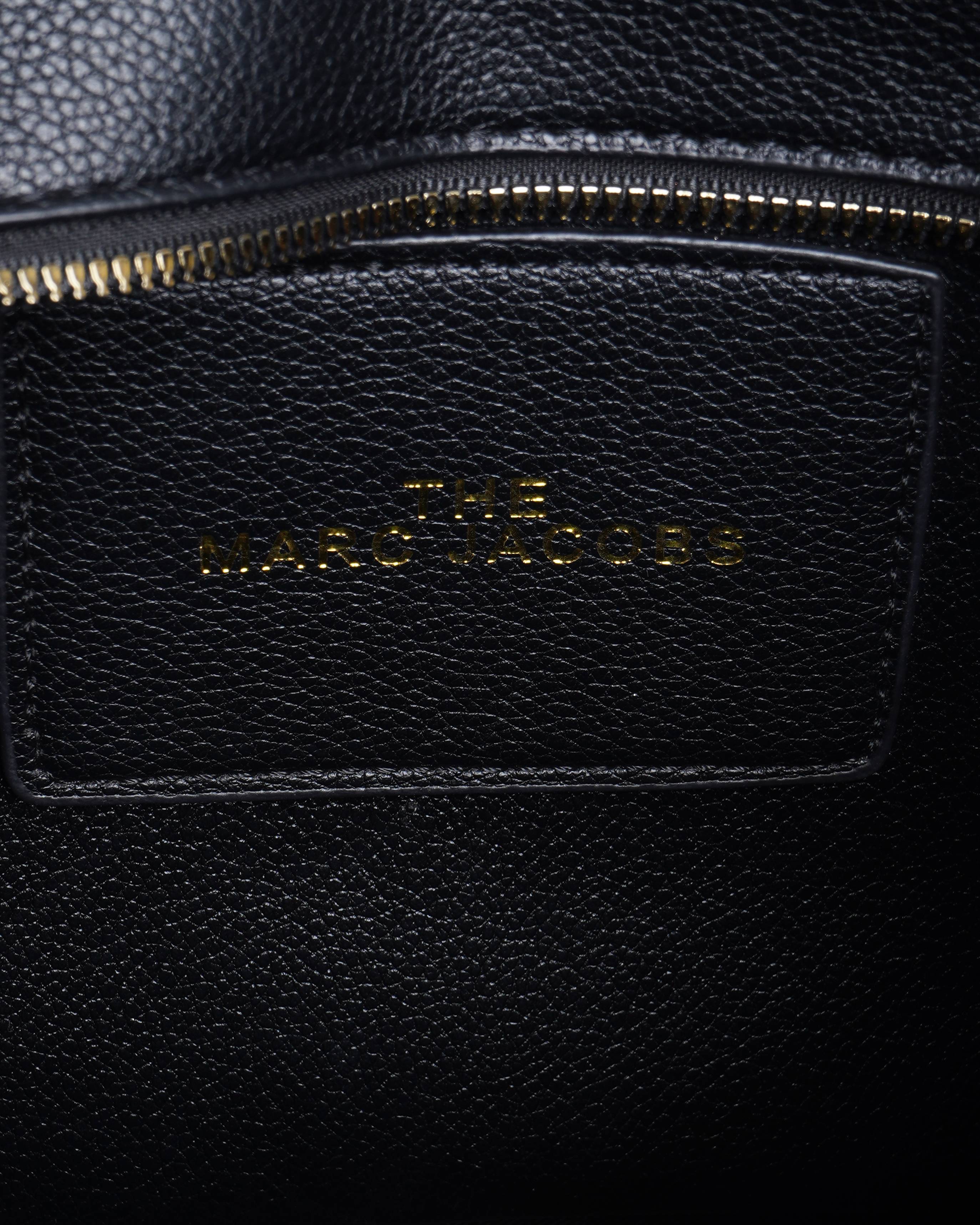 The marc jacobs black leather small tote bag