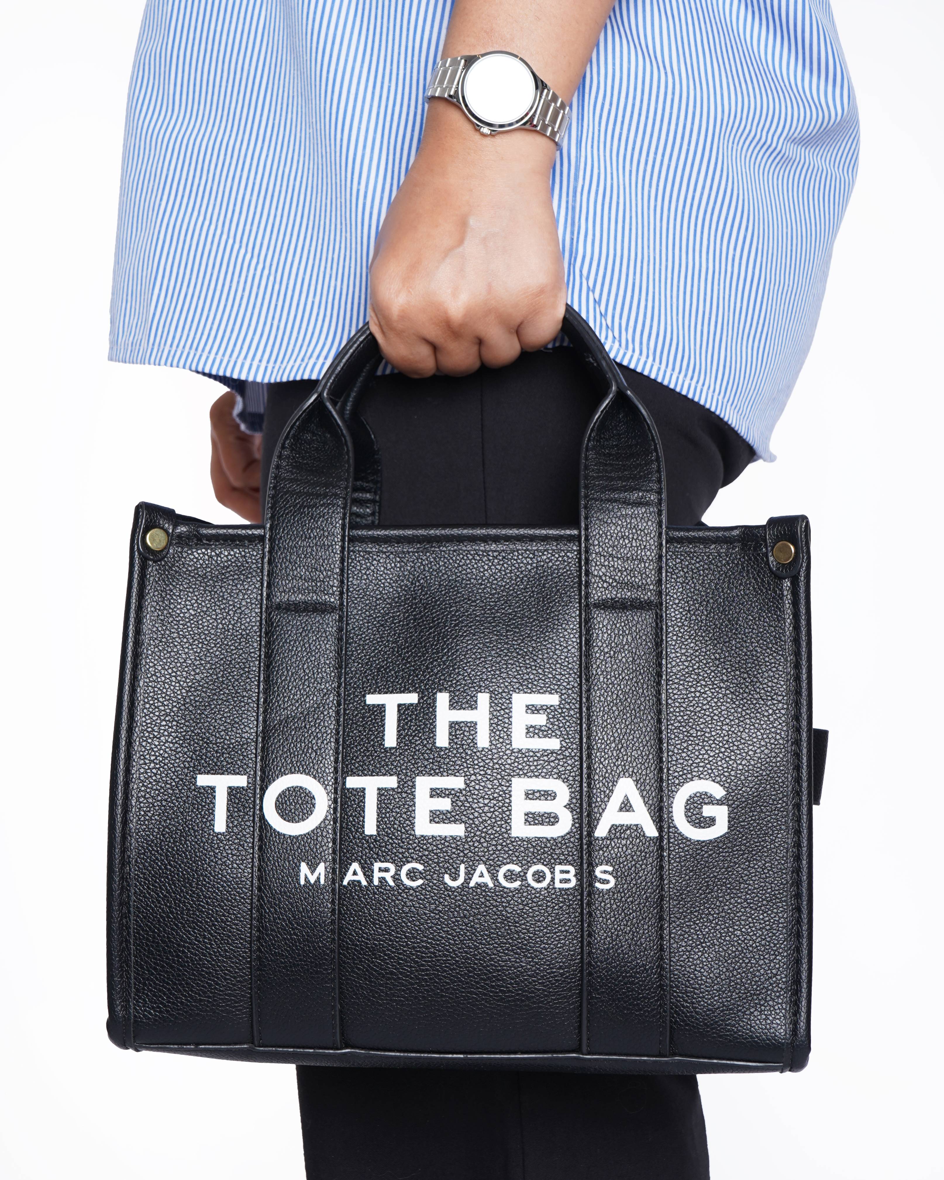 The marc jacobs black leather small tote bag