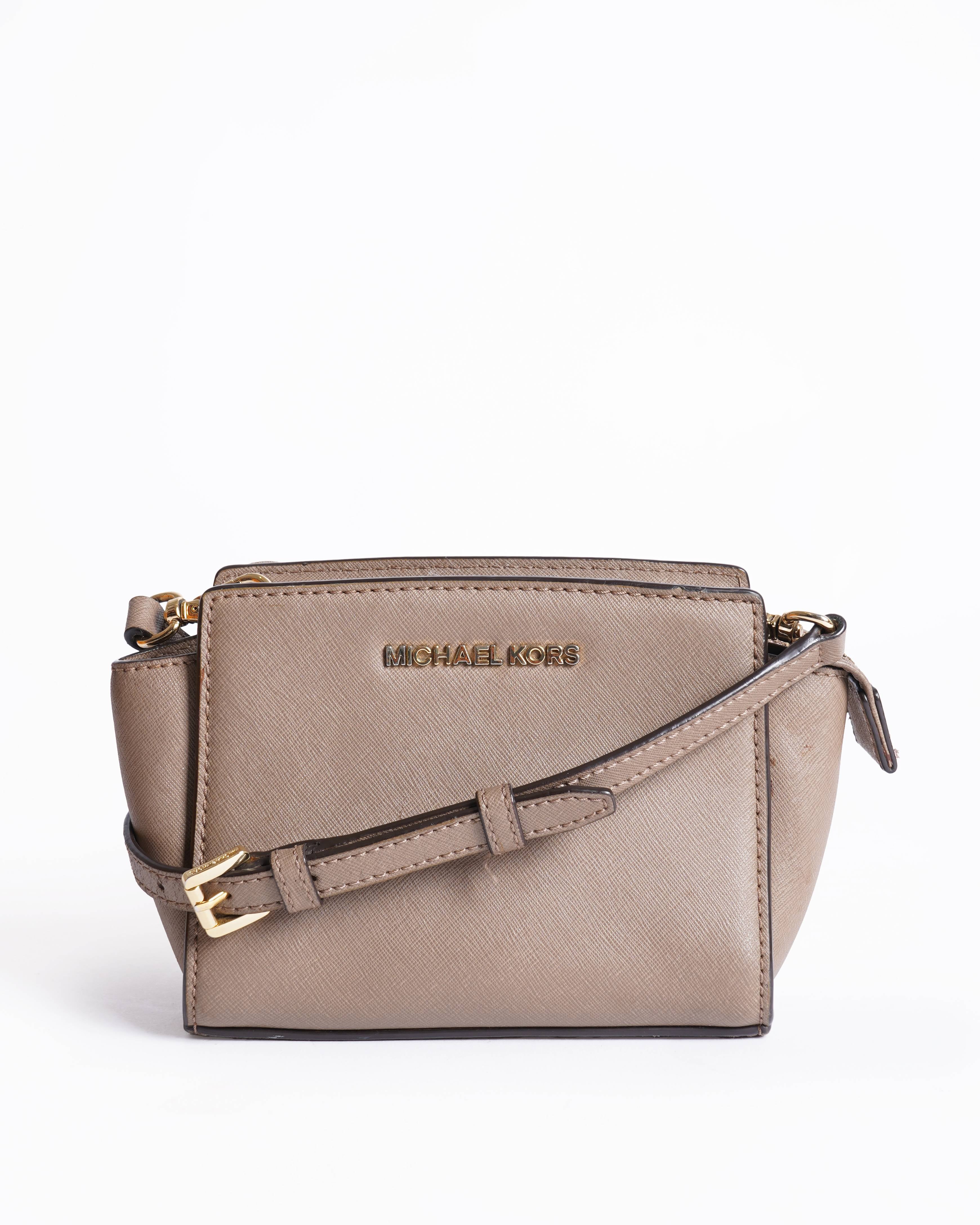 Michael kors 
Leather Mini Selma Crossbody bag