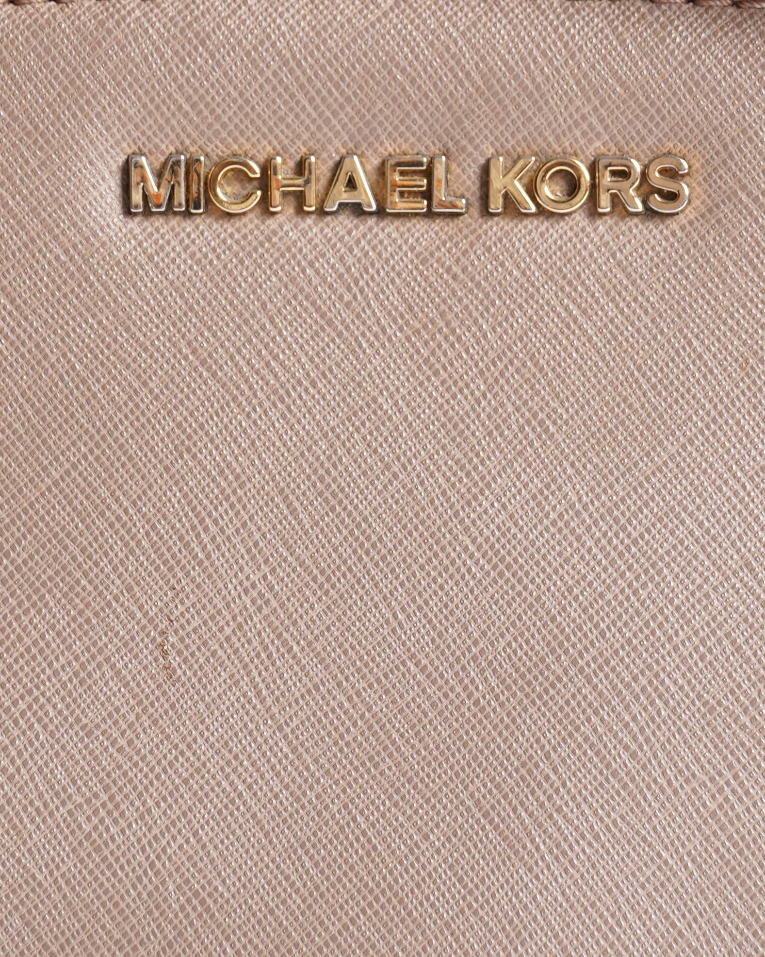 Michael kors 
Leather Mini Selma Crossbody bag