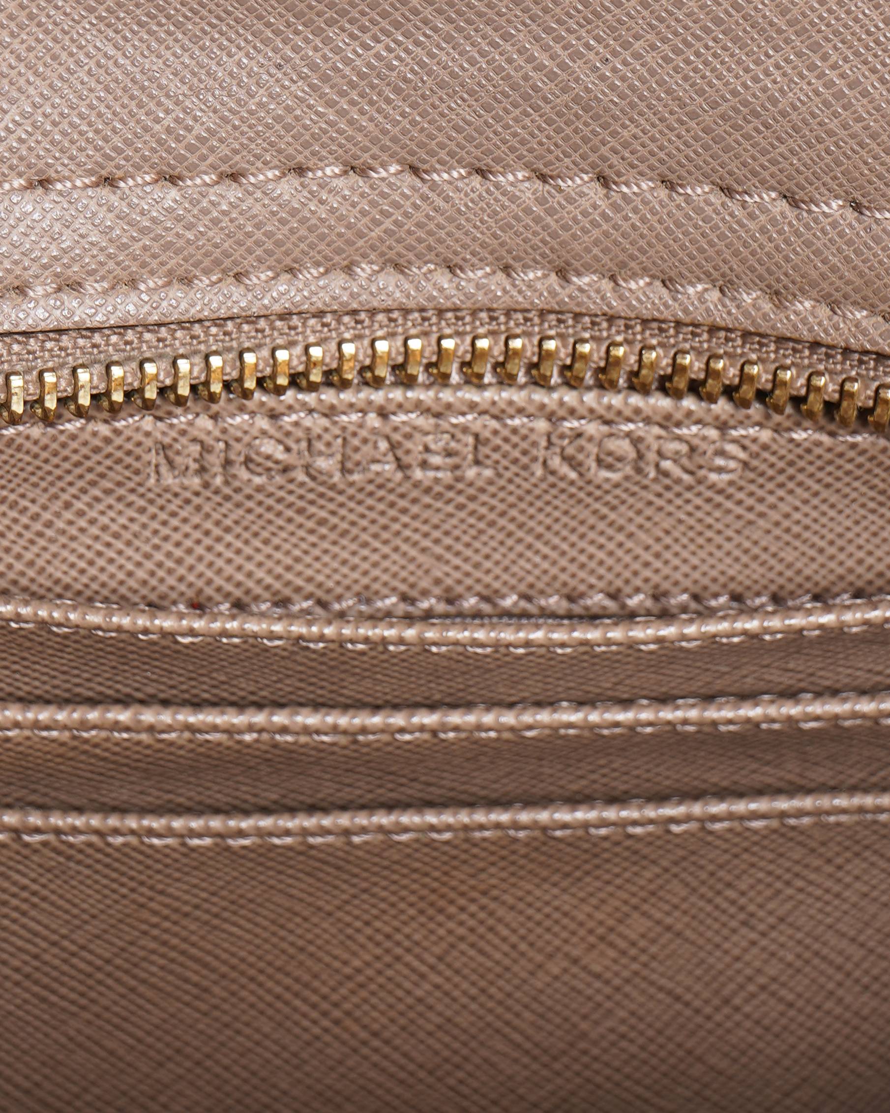 Michael kors 
Leather Mini Selma Crossbody bag