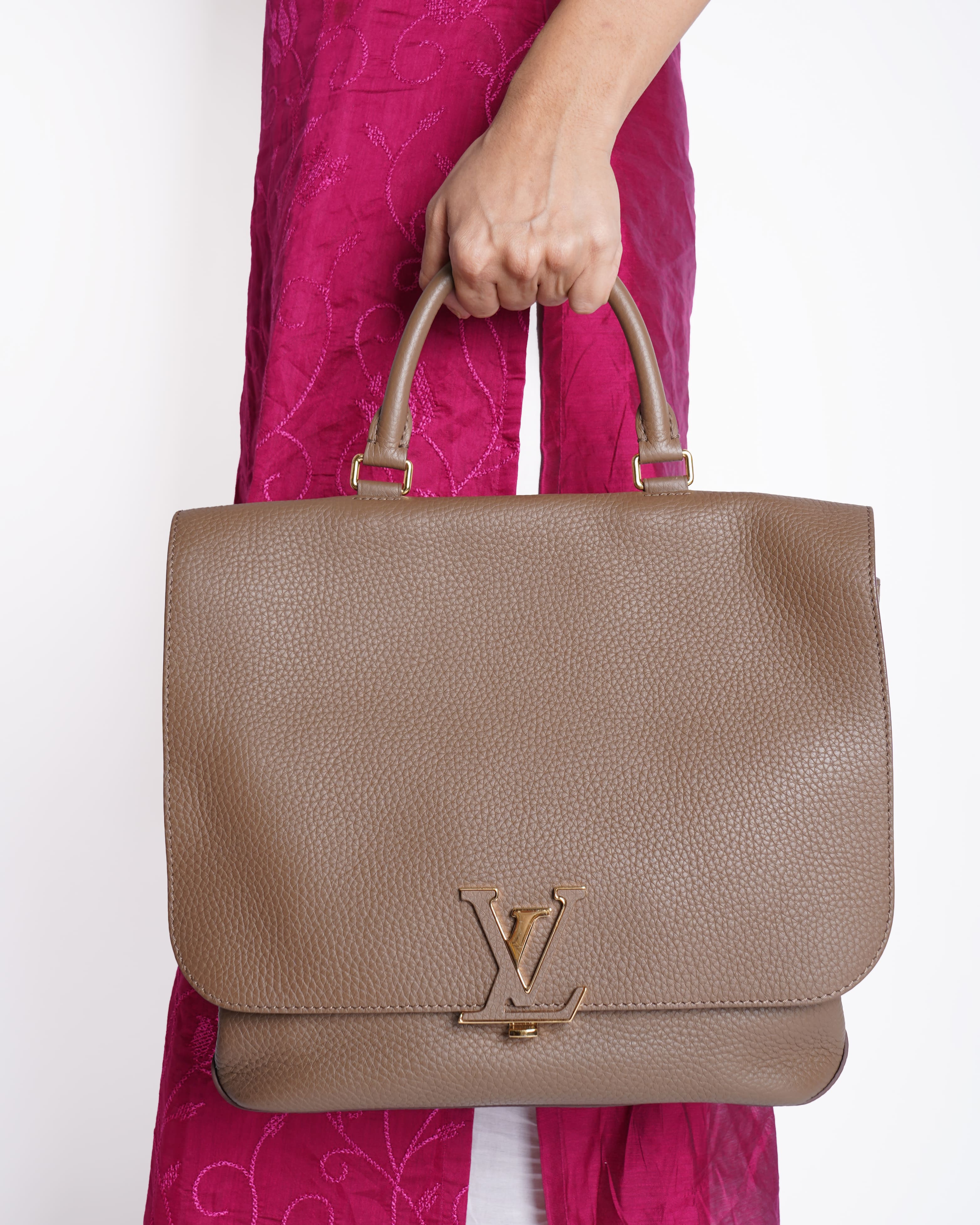 Louis Vuitton Volta Top Handle Bag In Beige