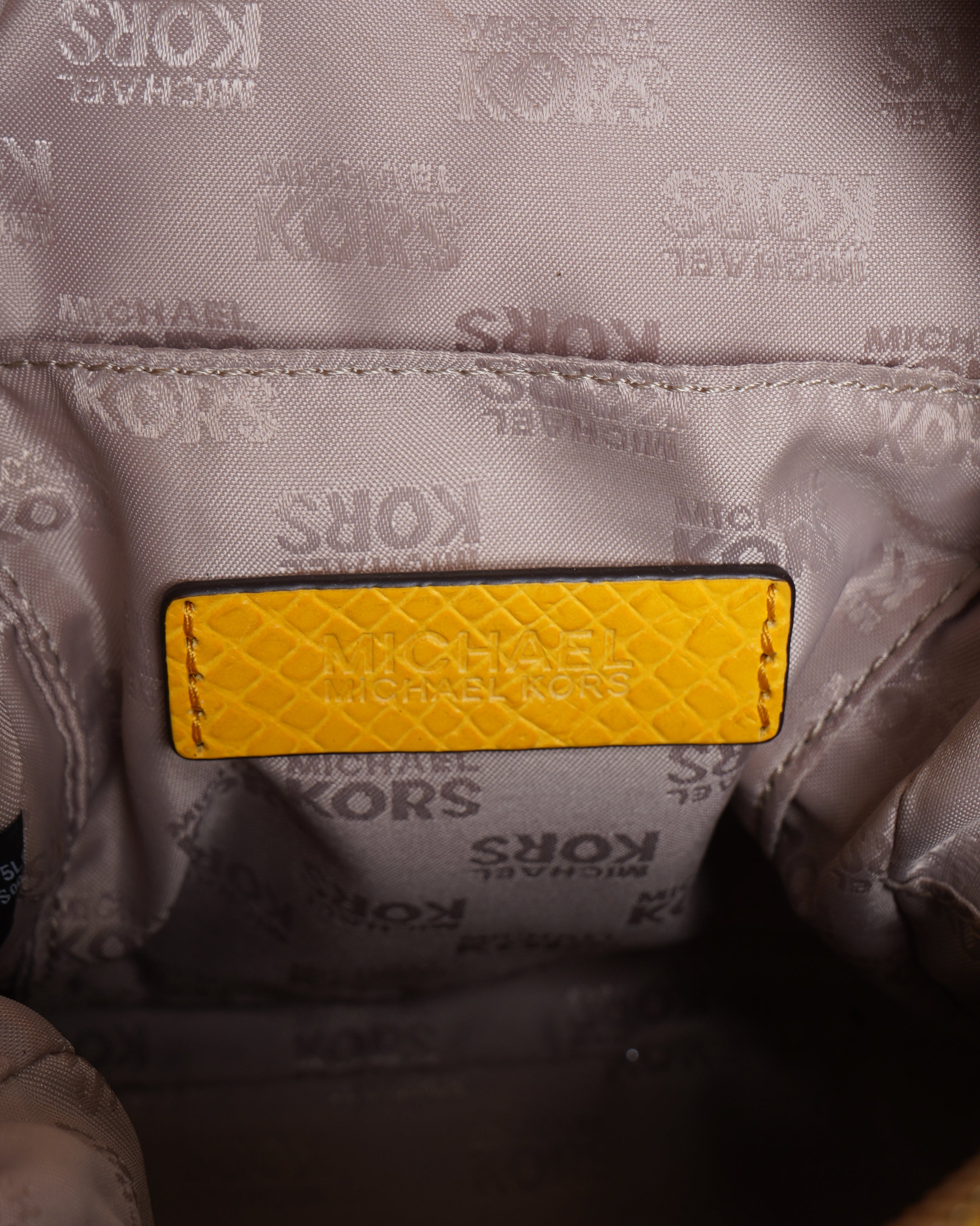 Michael kors leather embossed yellow backpack