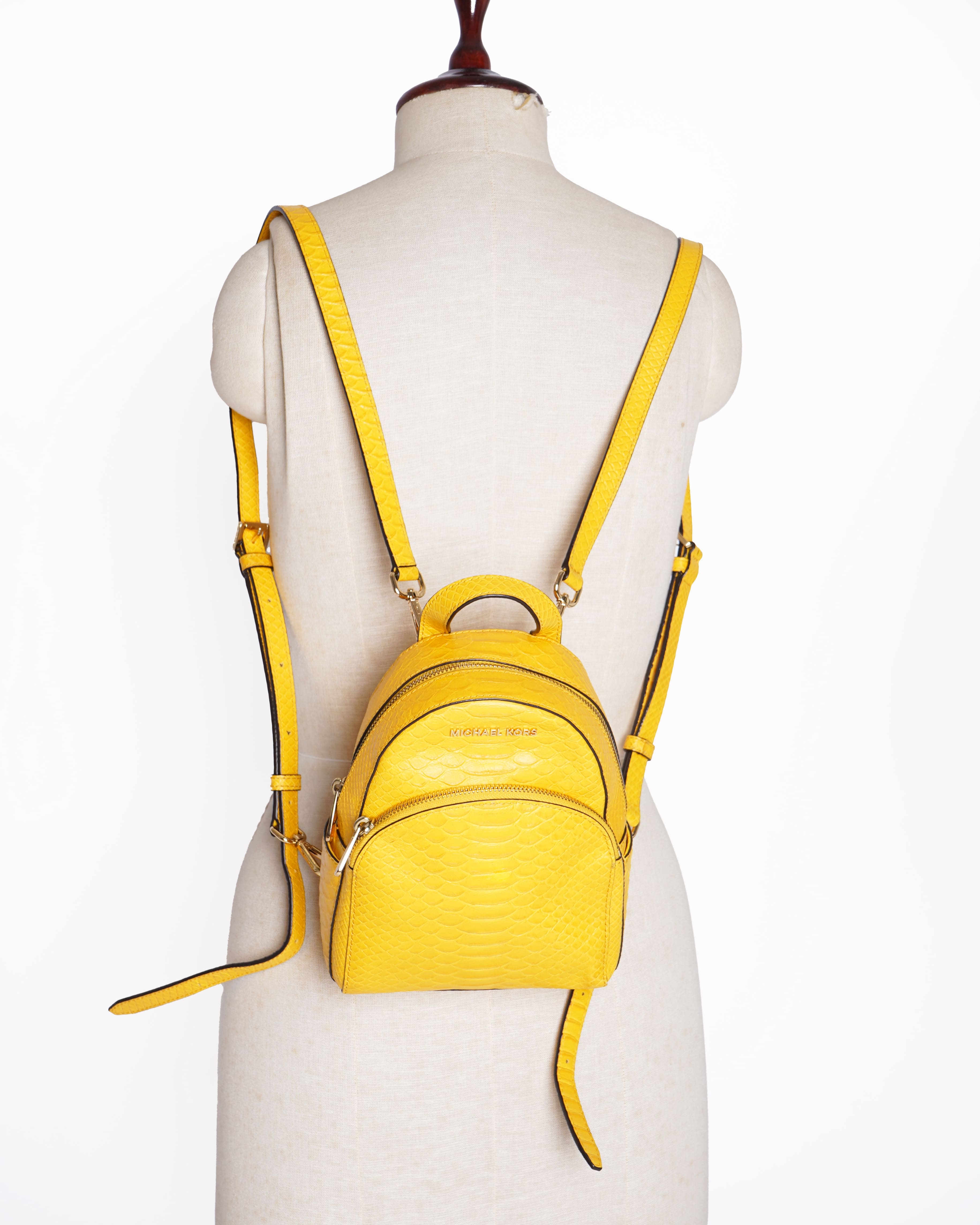 Michael kors leather embossed yellow backpack