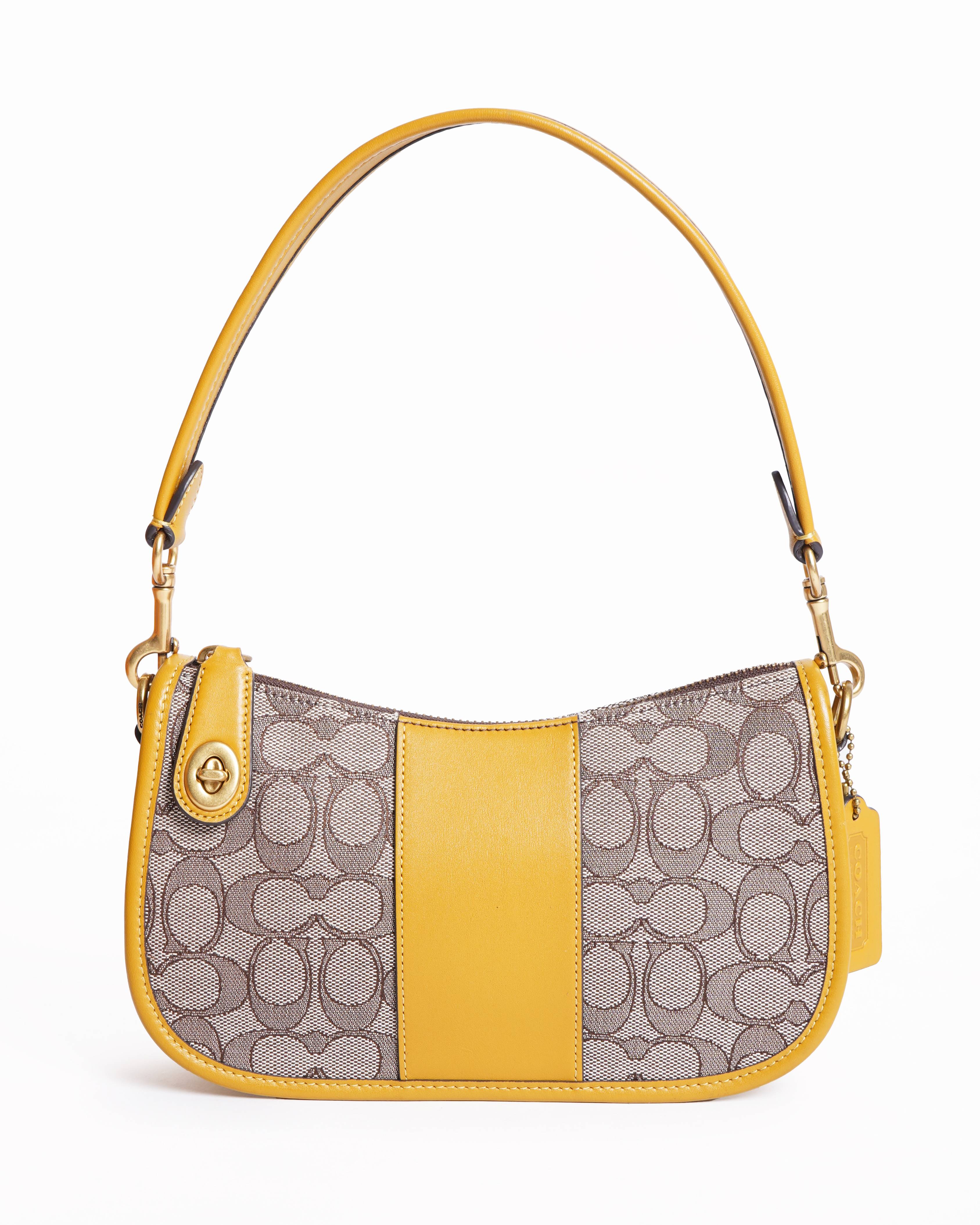 Coach swinger signature jacqurd shoulder bag