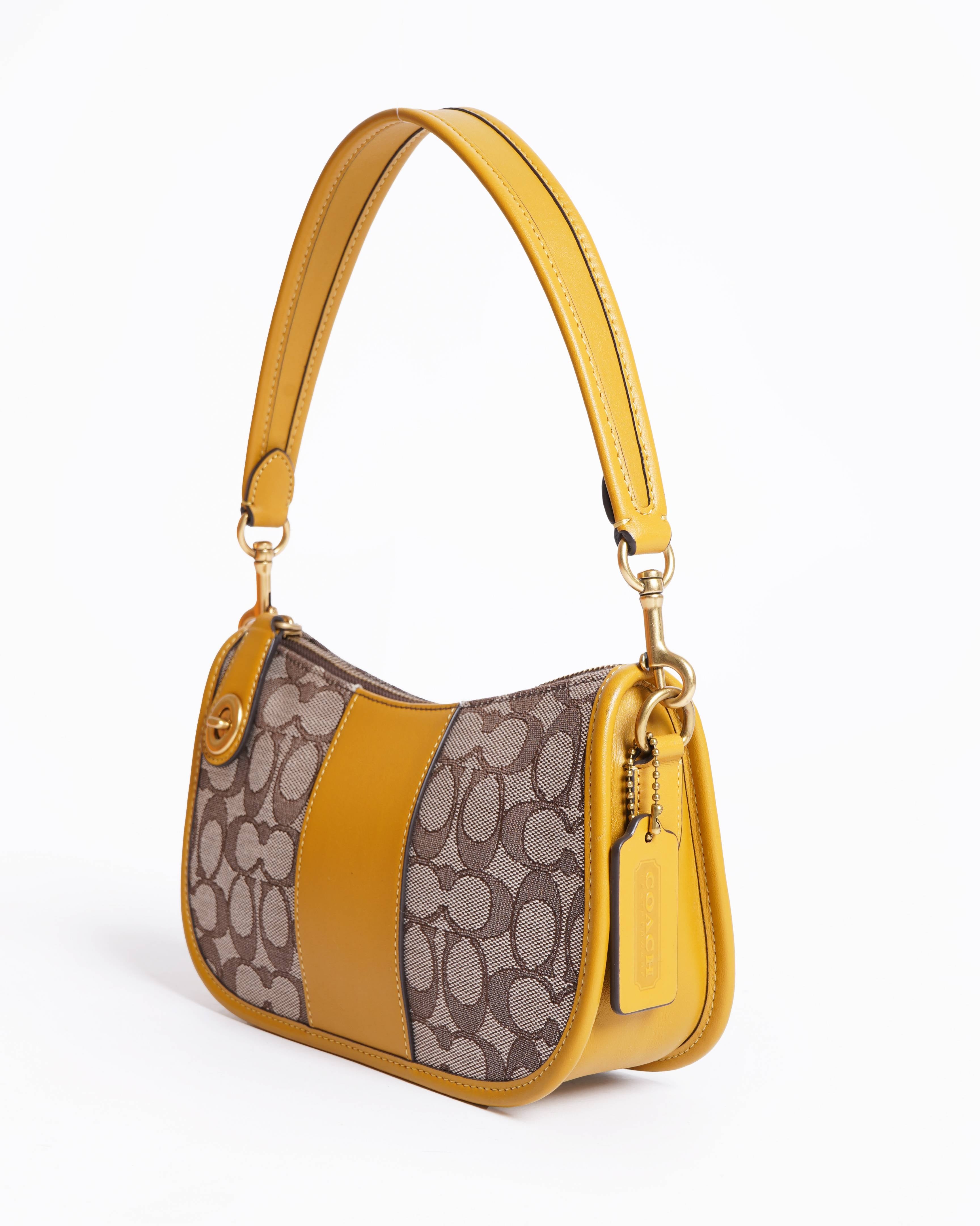 Coach swinger signature jacqurd shoulder bag