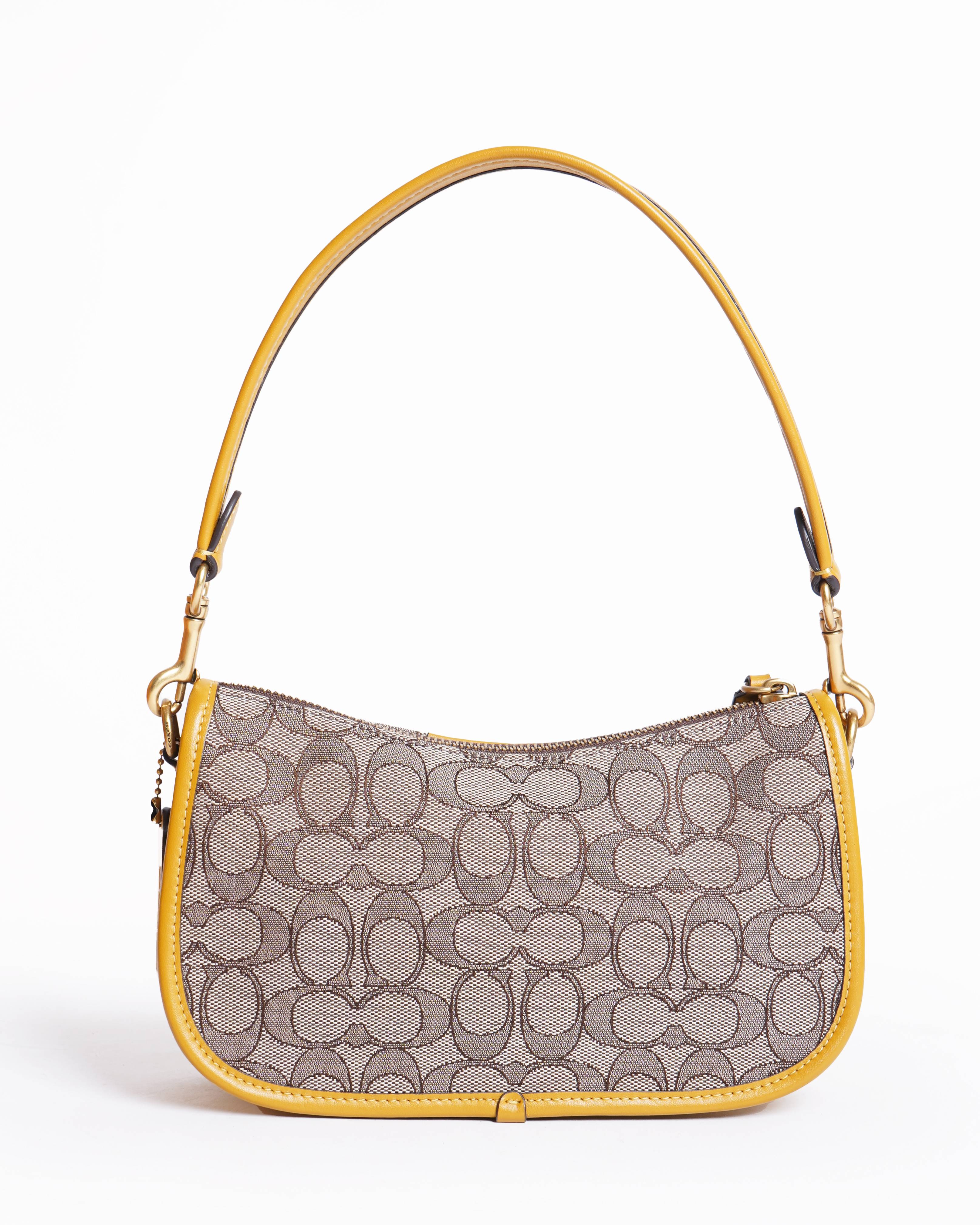 Coach swinger signature jacqurd shoulder bag