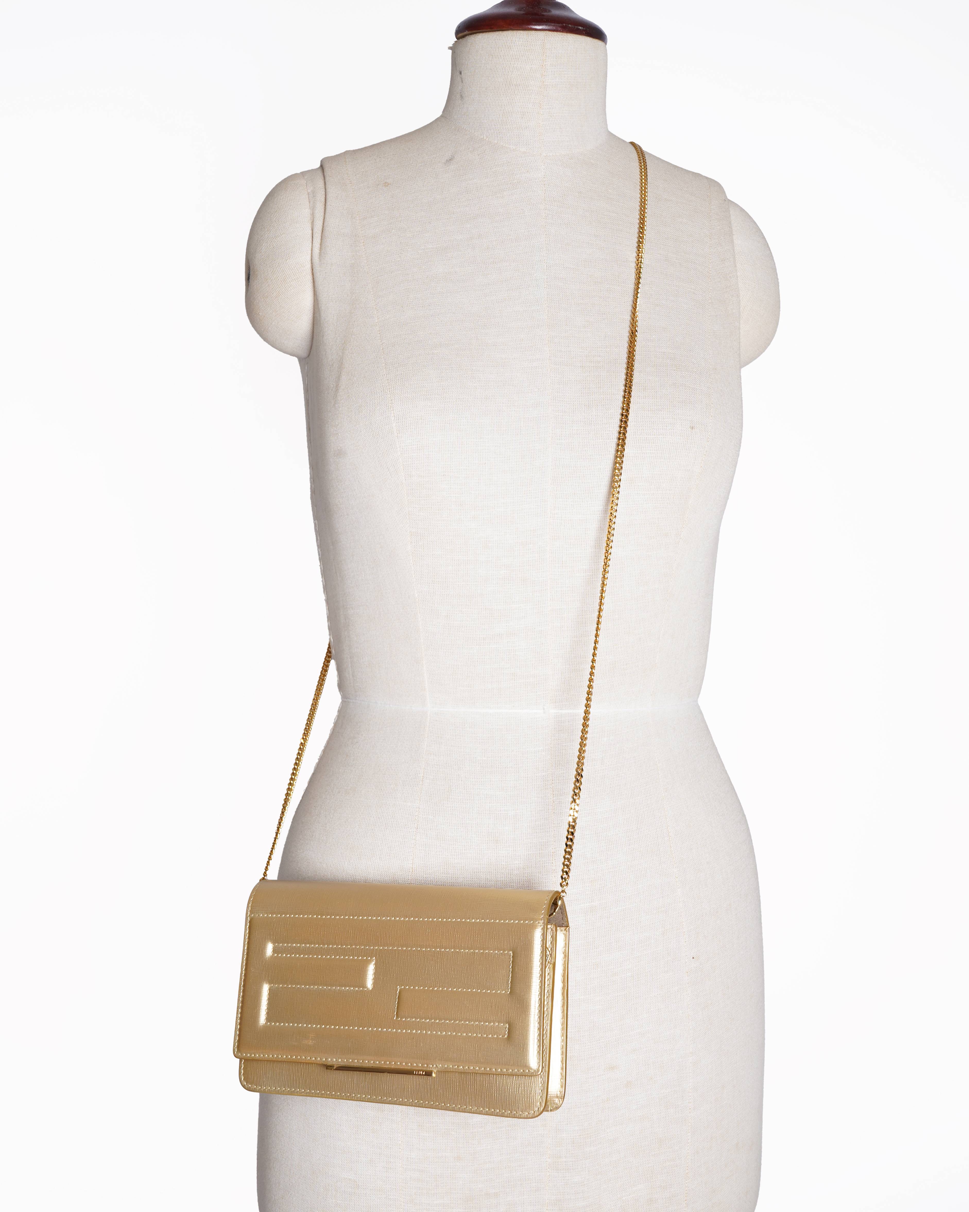 Fendi gold leather tube wallet on chain