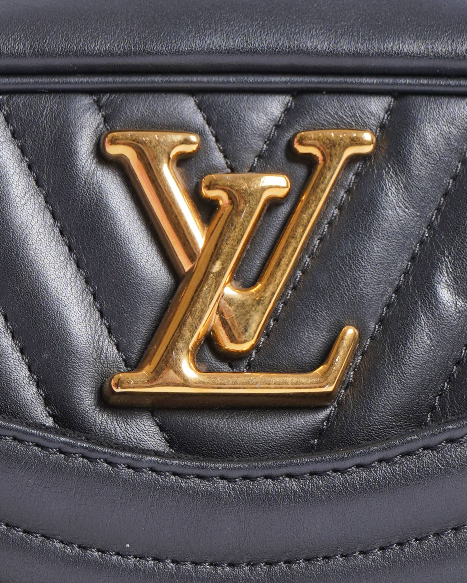 Louis Vuitton calfskin wave camera bag in black