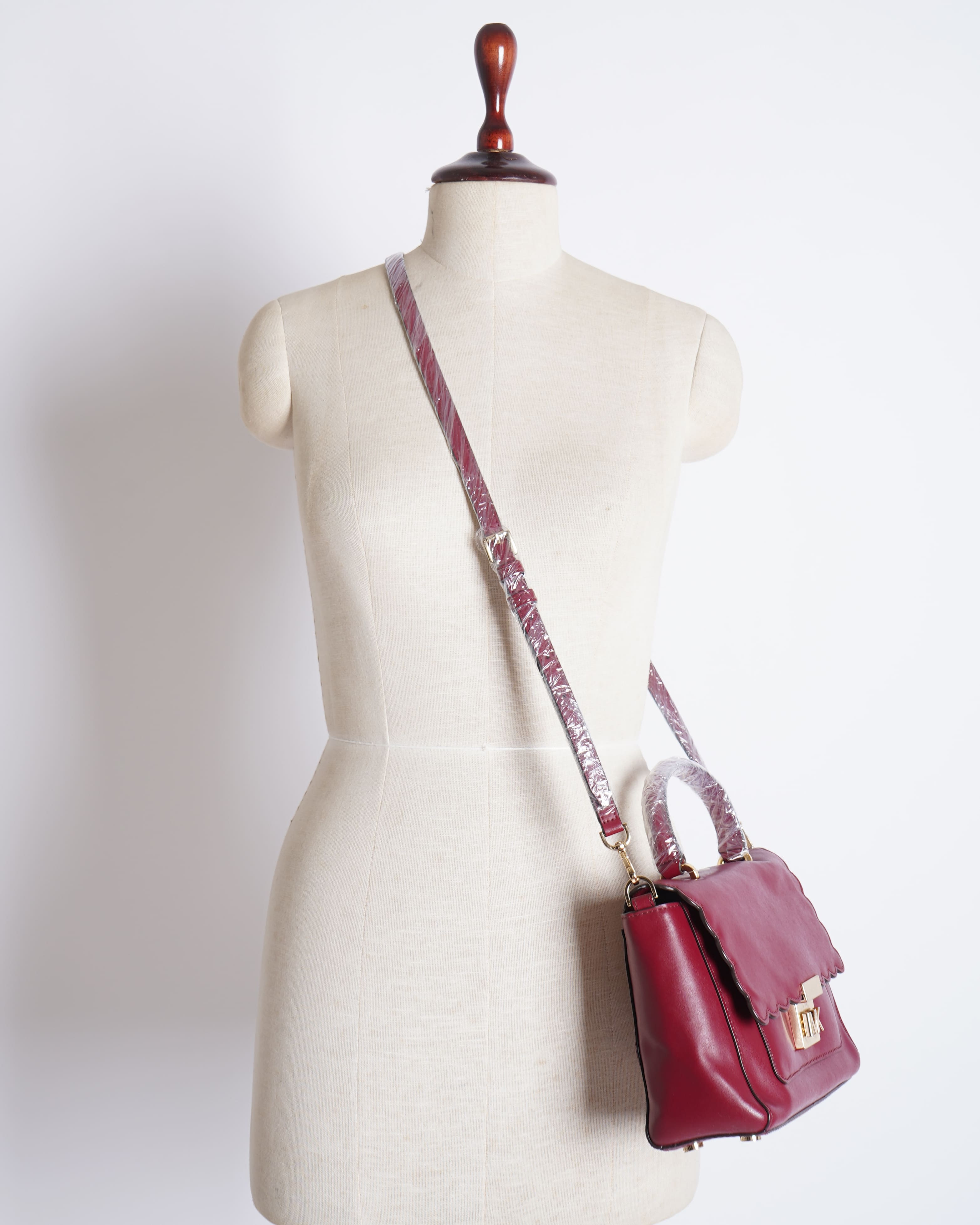 Michael Kors leather bag in maroon