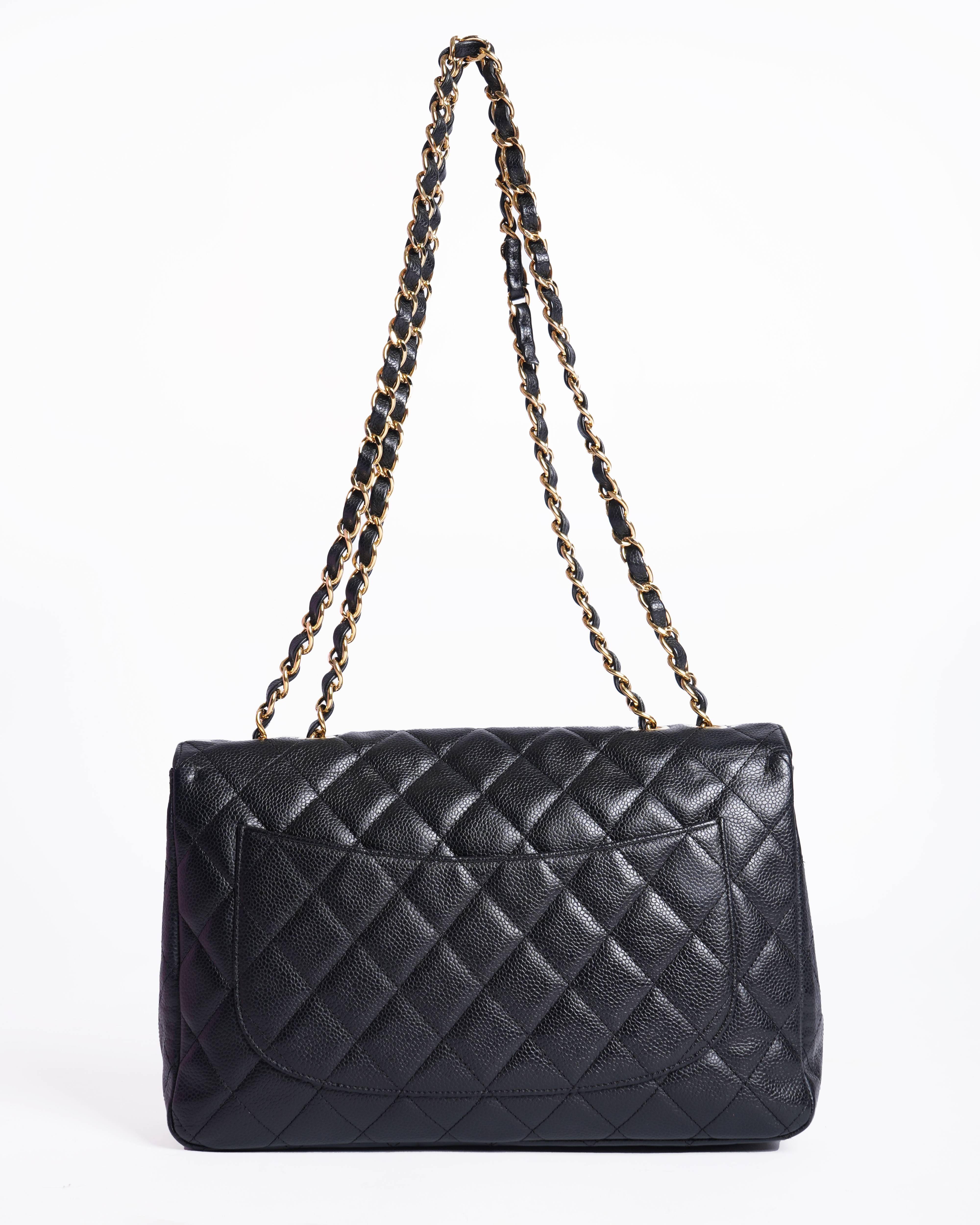 Chanel maxi classic flap in grained calfskin and gold hardware Shoulder Bag