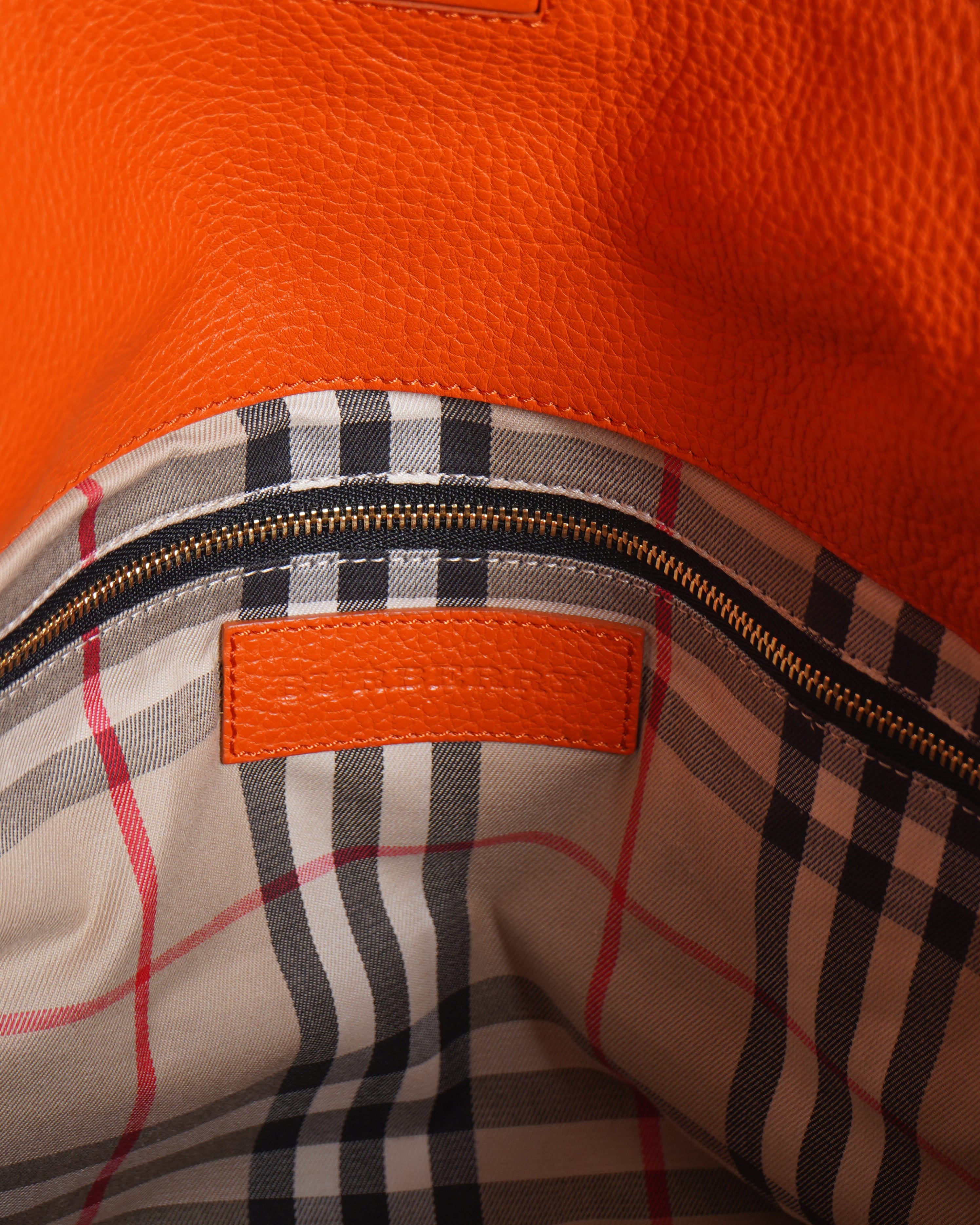 Burberry Baynard Leather Tote In Orange