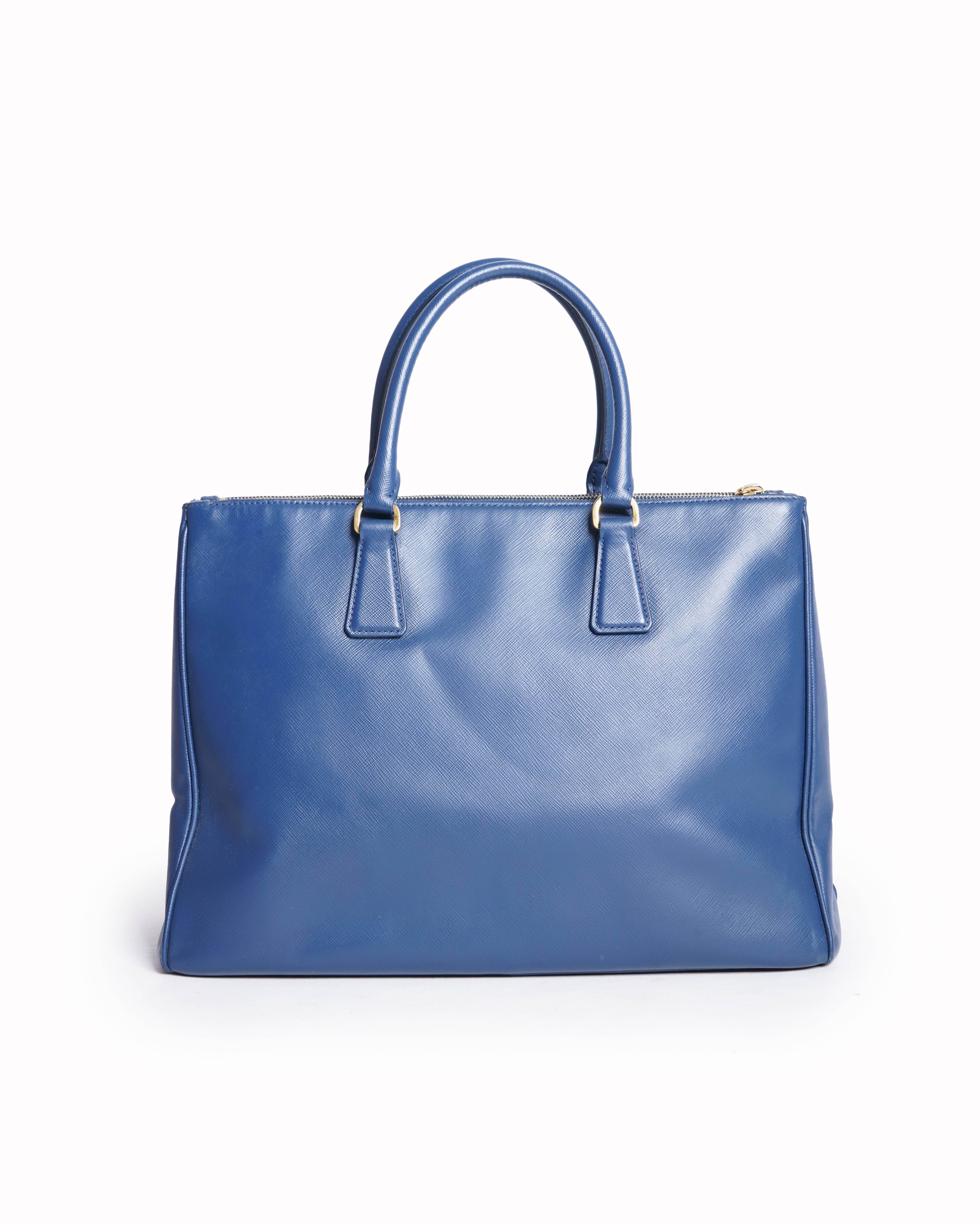 Prada
blue saffiano leather bauletto satchel in black