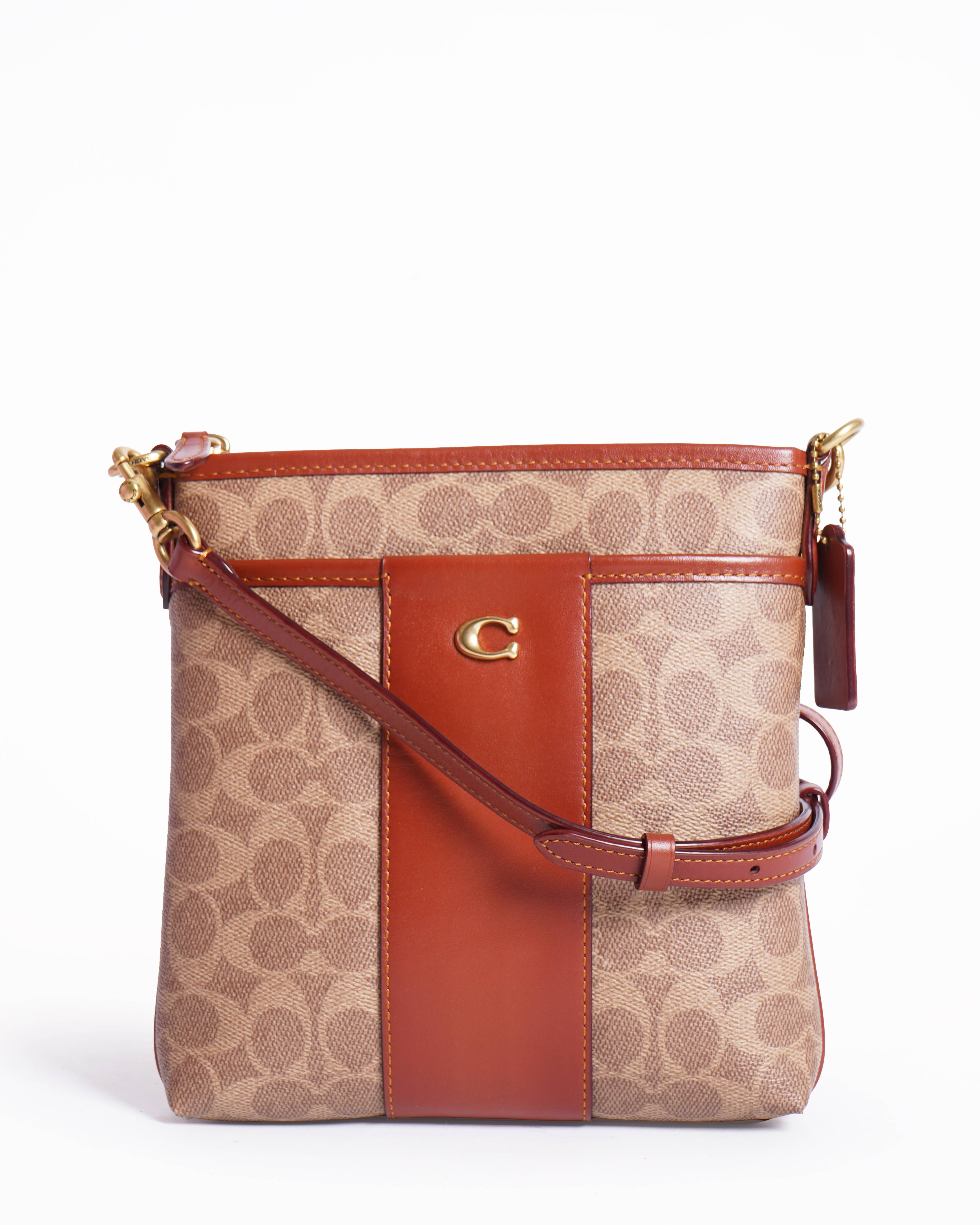 Coach Kitt messenger crossbody in signature canvas