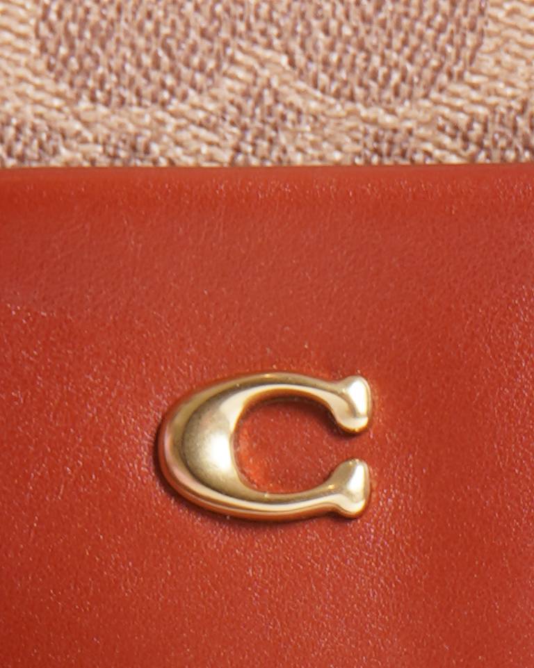 Coach Kitt messenger crossbody in signature canvas