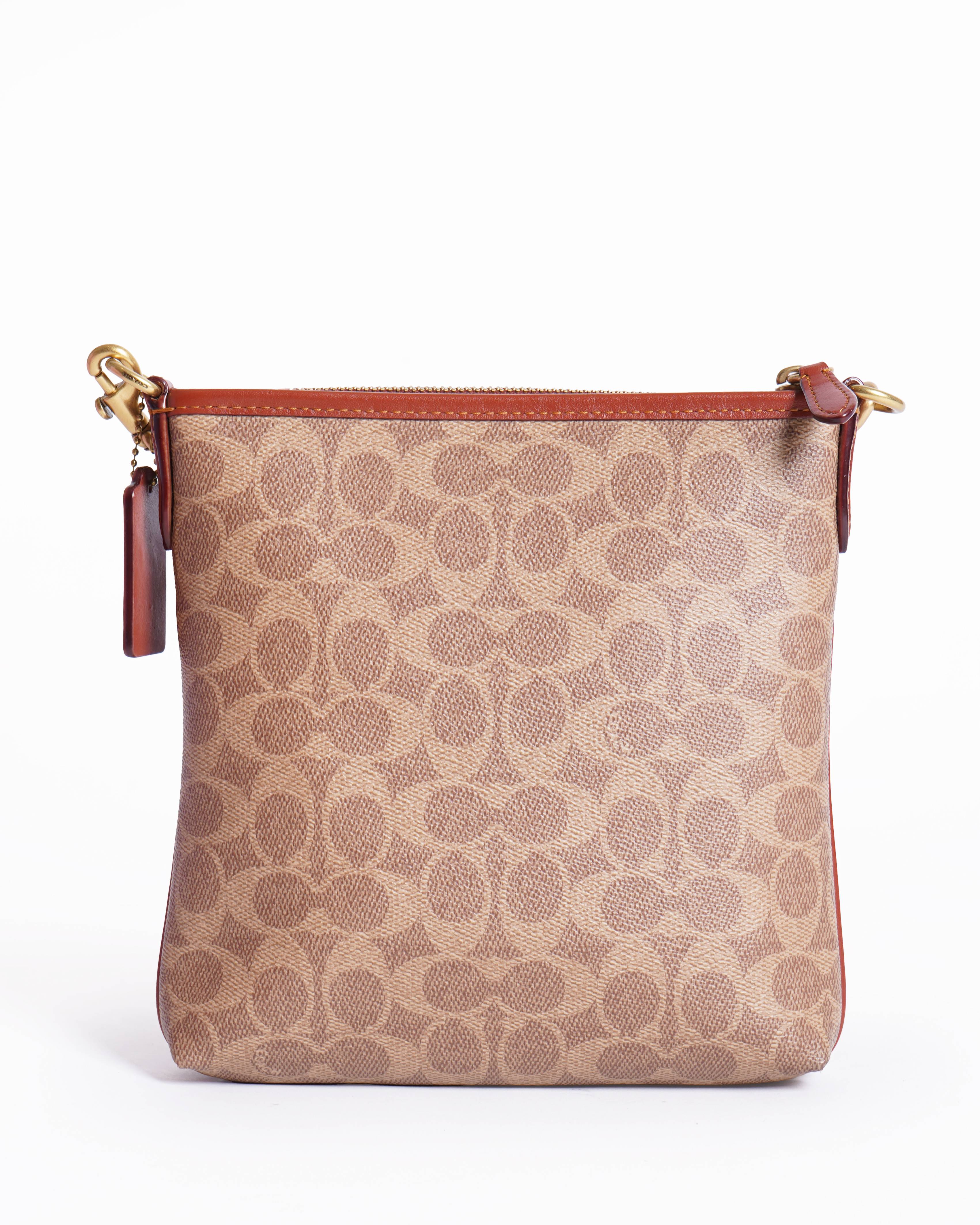 Coach Kitt messenger crossbody in signature canvas