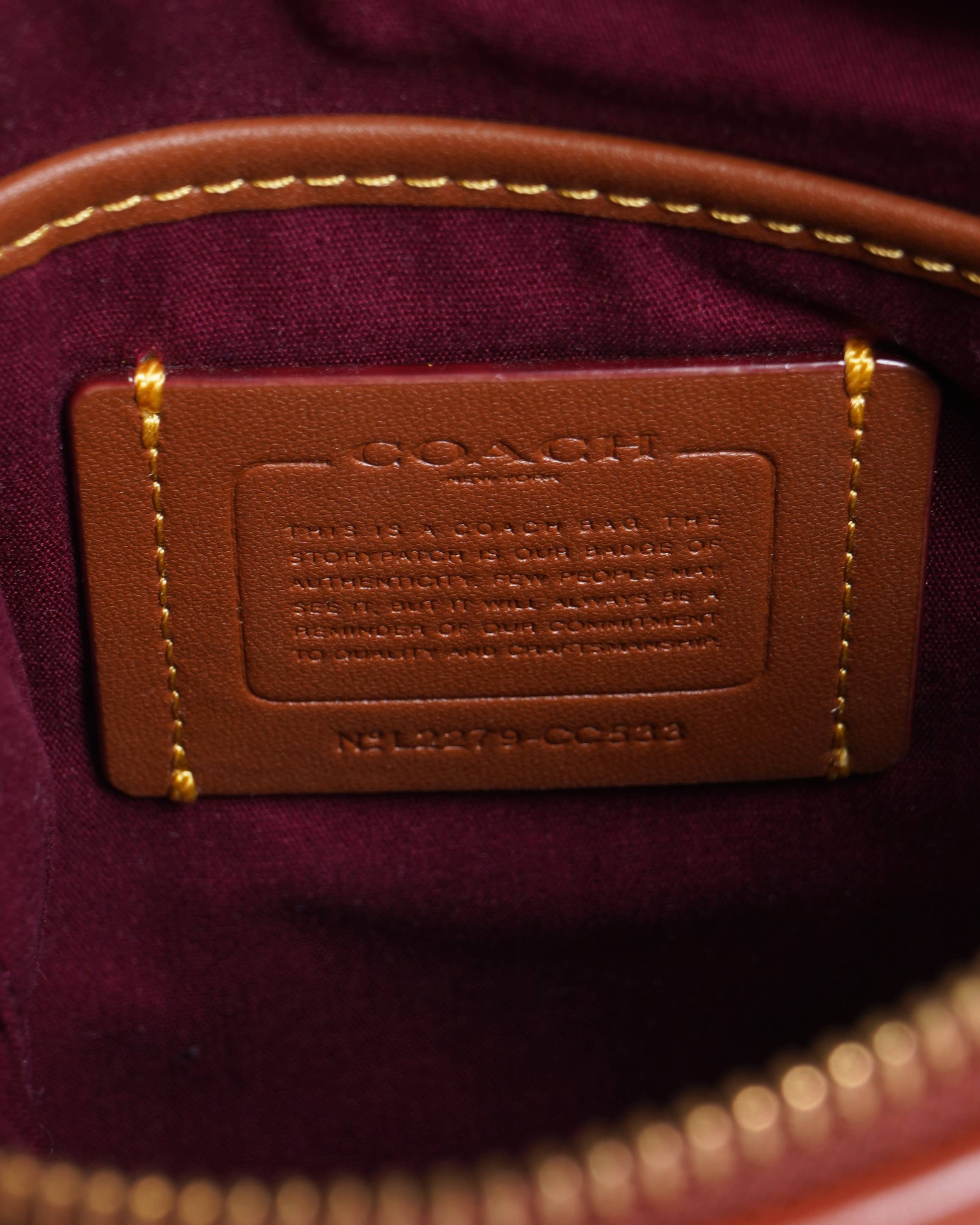 Coach Kitt messenger crossbody in signature canvas