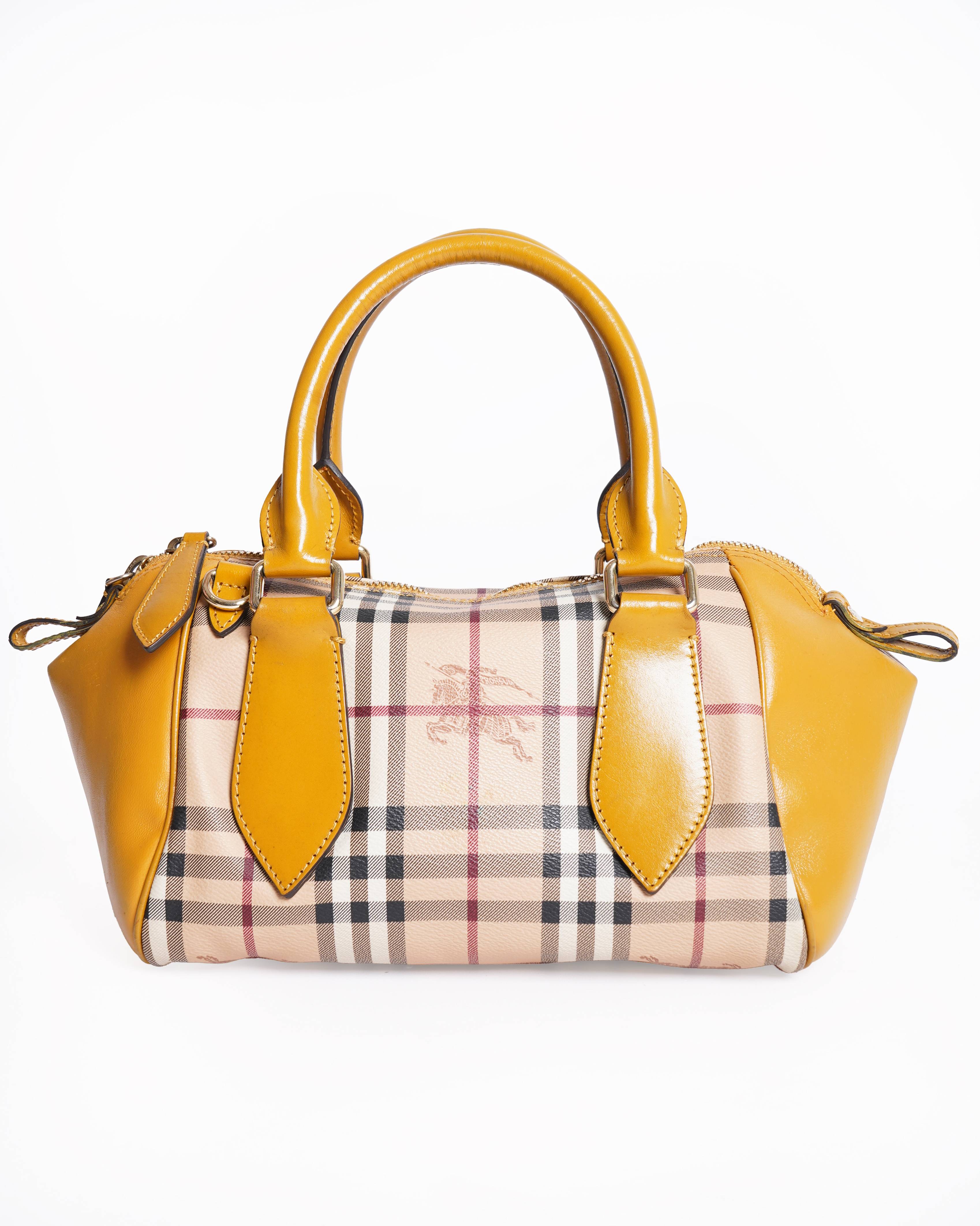 Burberry
Beige/Mustard Haymarket Check Mini HandBag