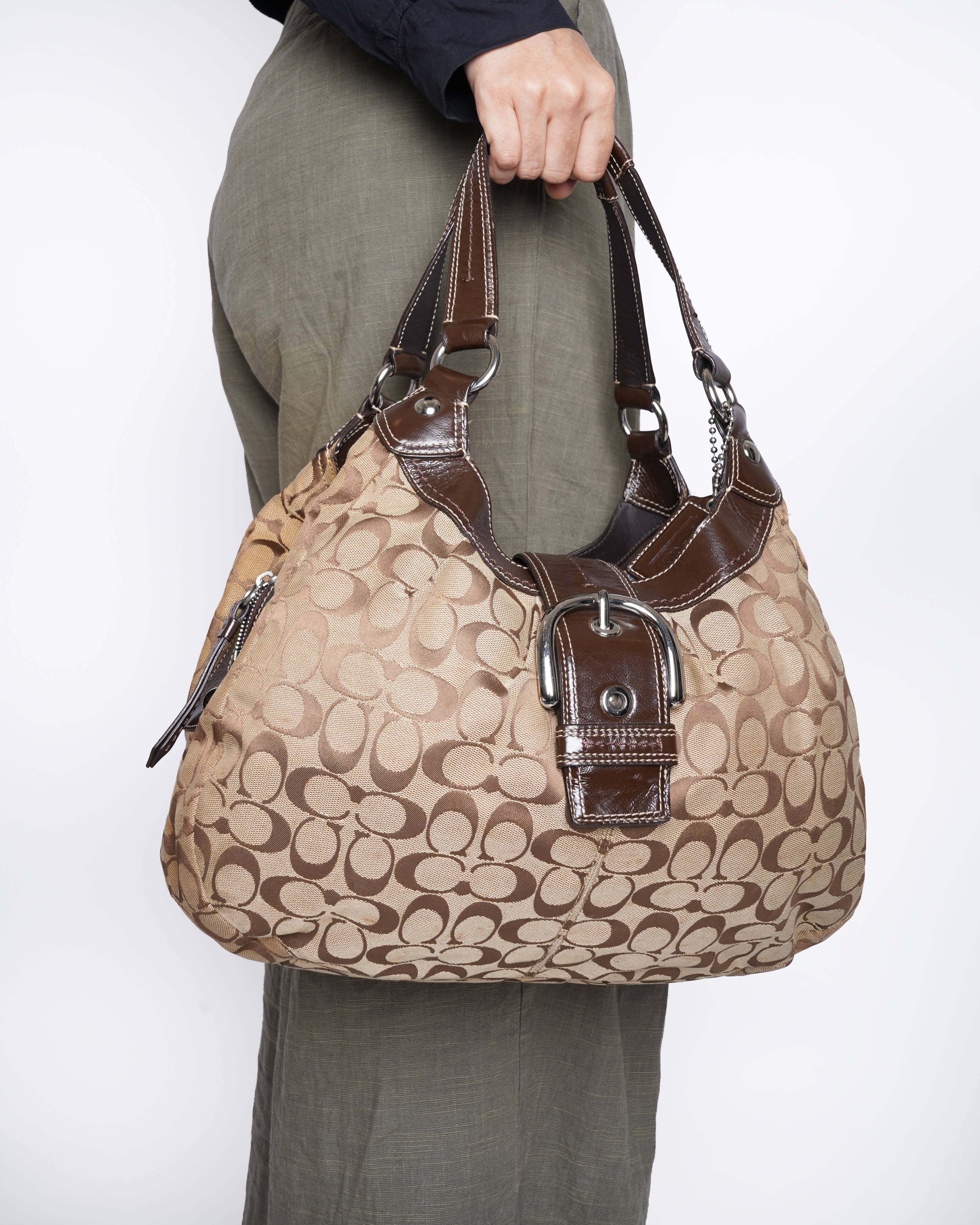 Coach Soho Lynn Hobo bag in a brown signature jacquard canvas