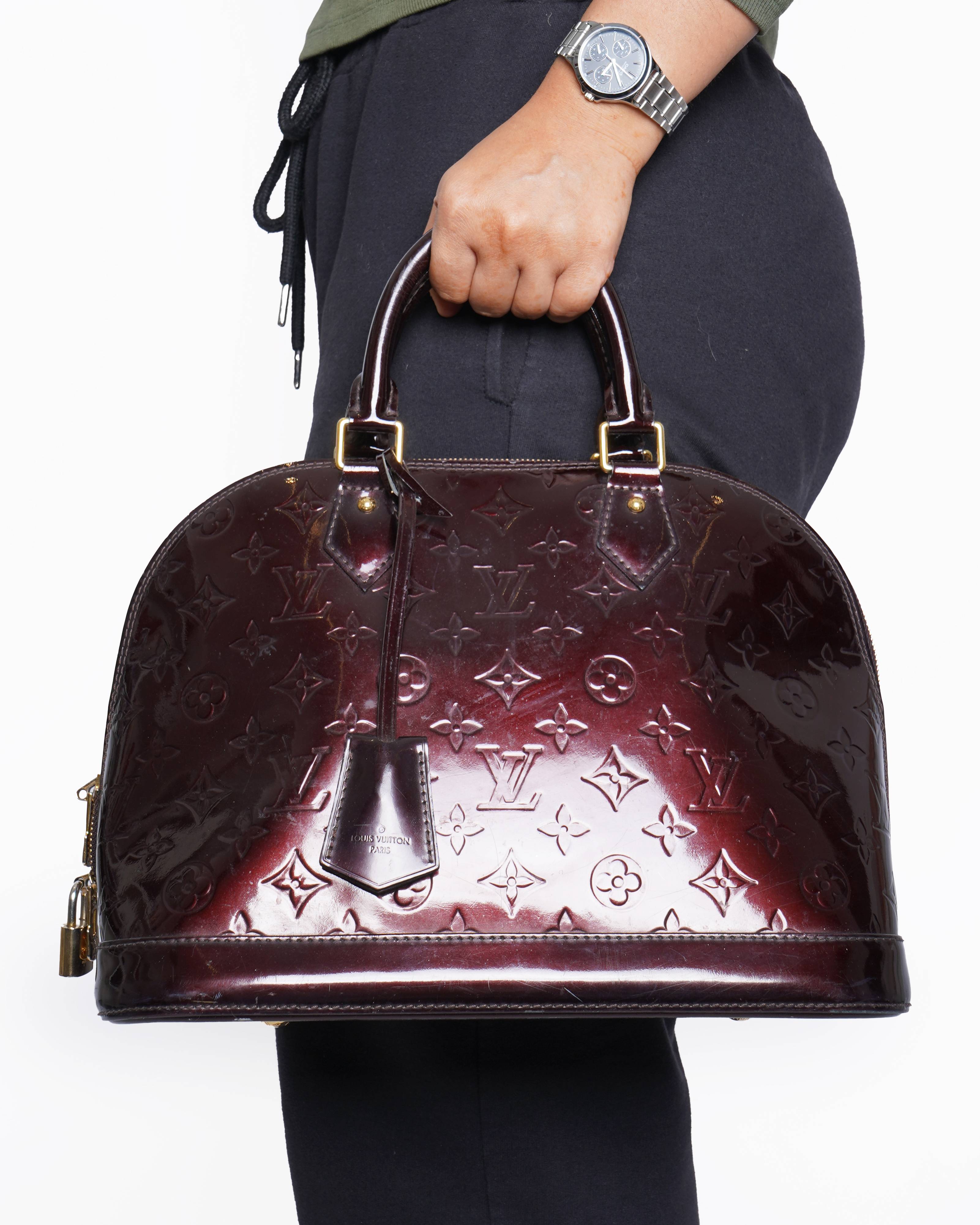 Louis Vuitton GM vernis amarante handbag