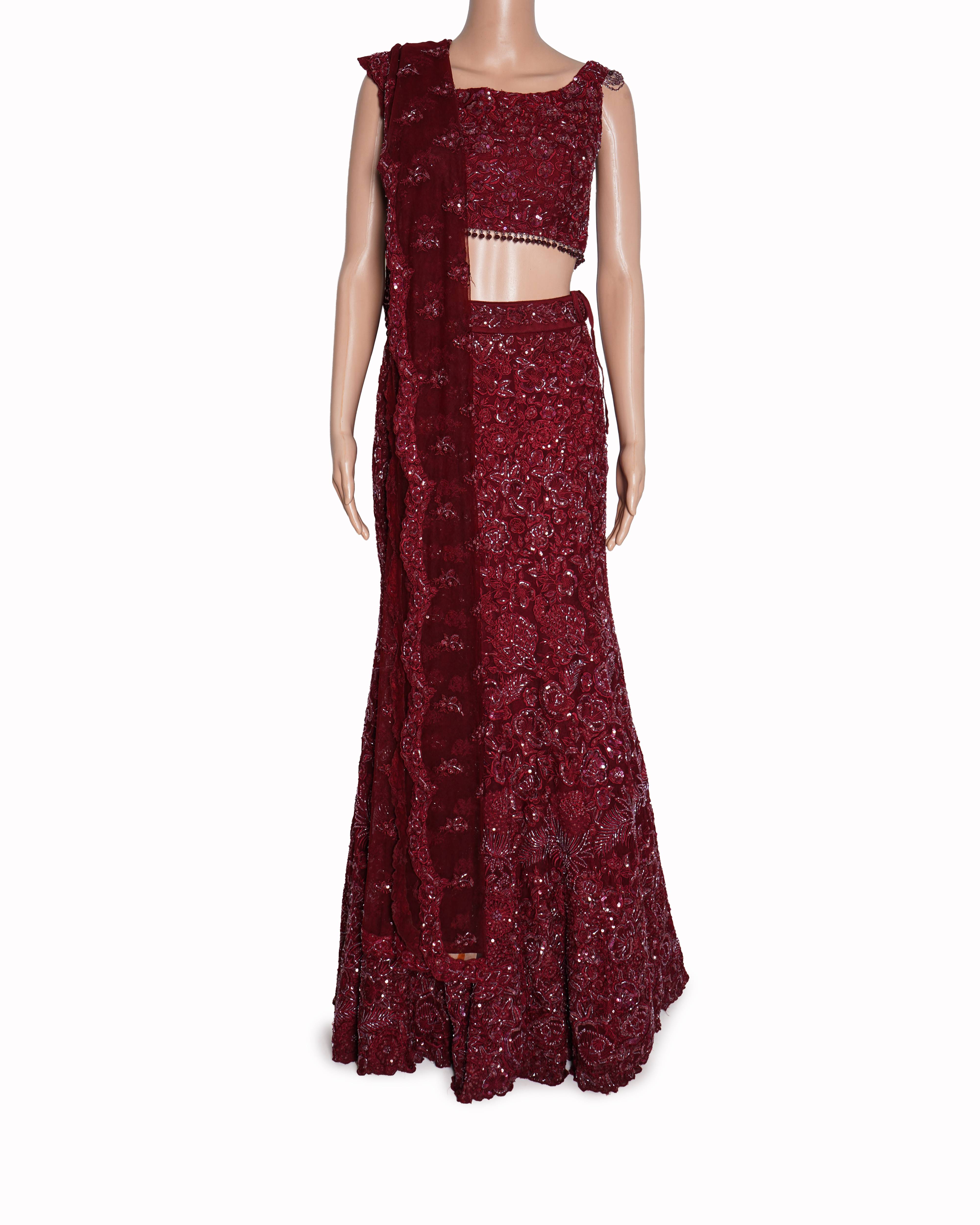 Shyamal & Bhumika
The Ruby Wine Embroidered and Sequined Fluted Lehenga