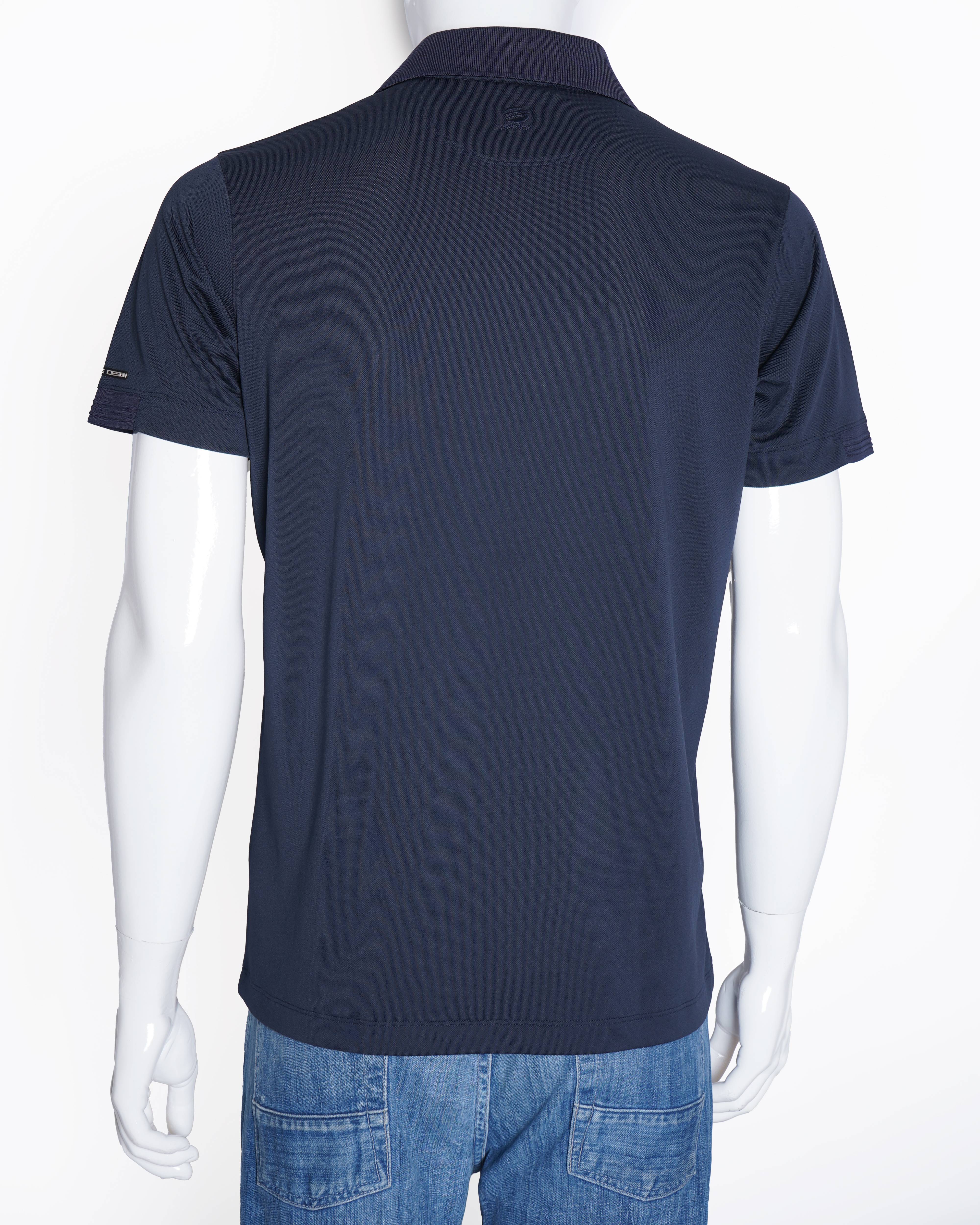 Porsche design x Adidas
Polo T shirt In Ink Blue