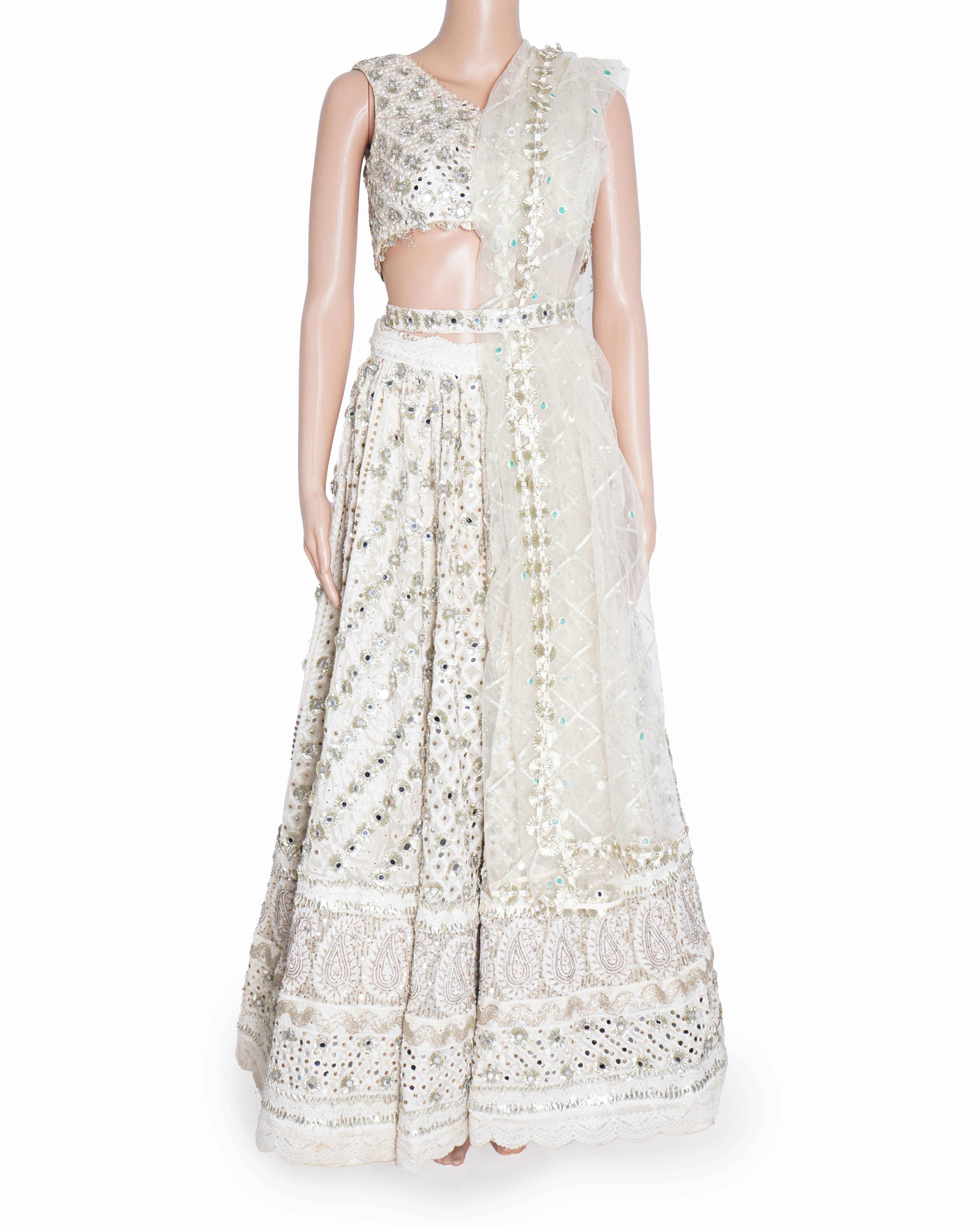 Monica Nidhi Ivory Heavy Embroidered Lehenga Set
