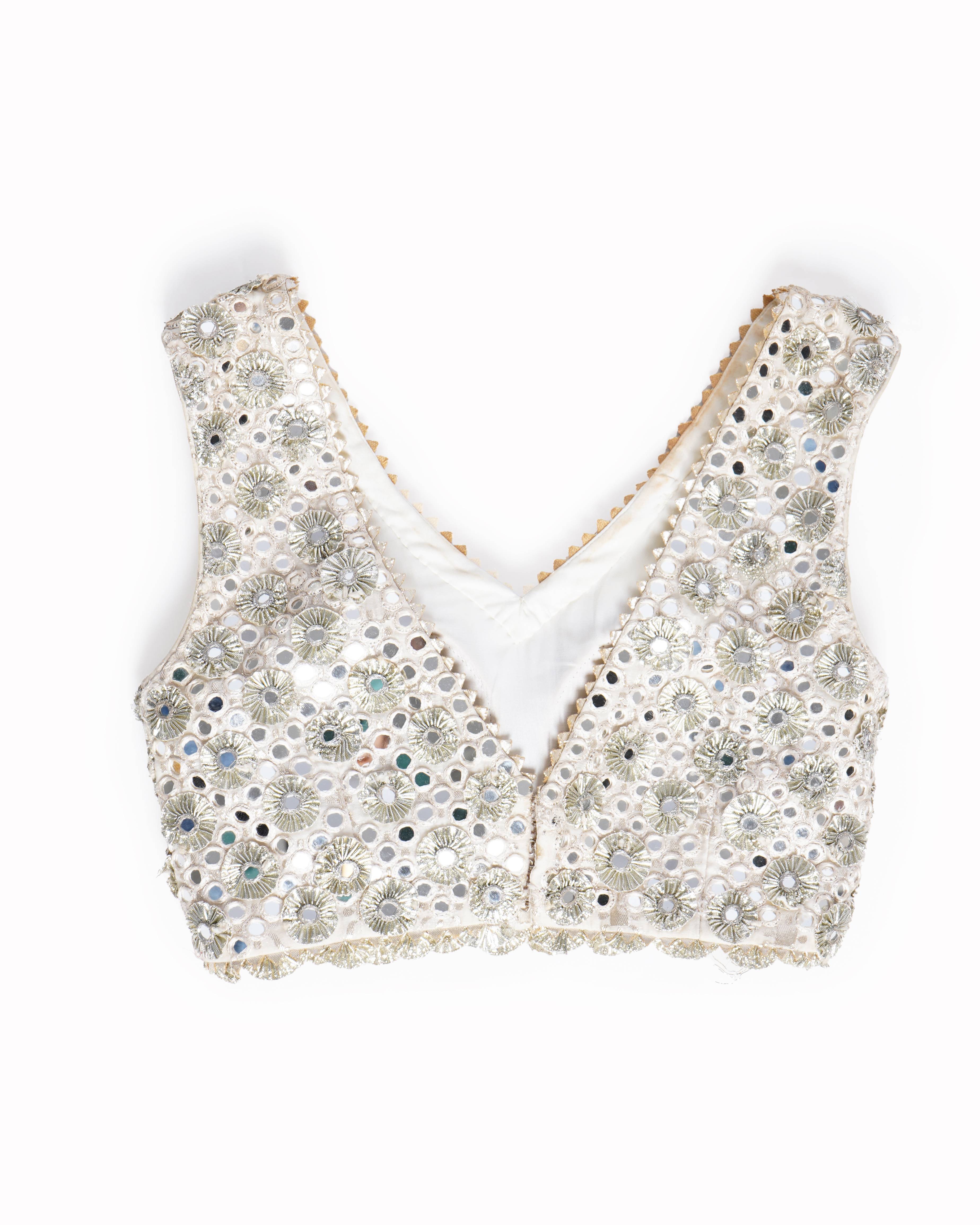 Monica Nidhi Ivory Heavy Embroidered Lehenga Set