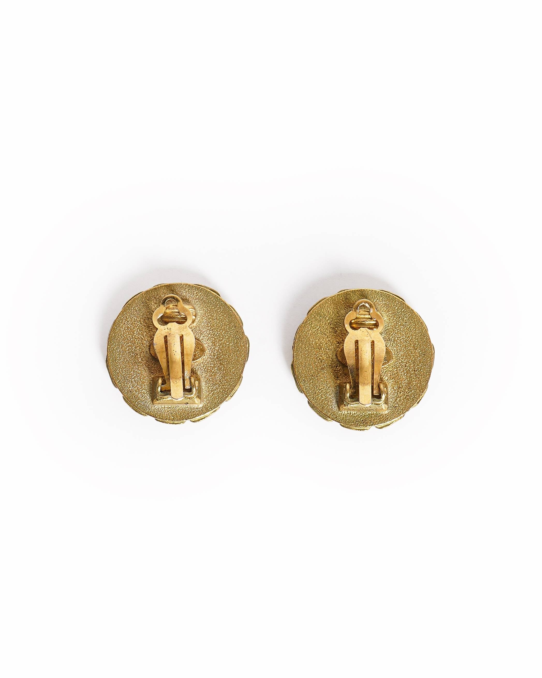 Vintage Chanel Gold CC Logo Earrings With A Black Resin Center
